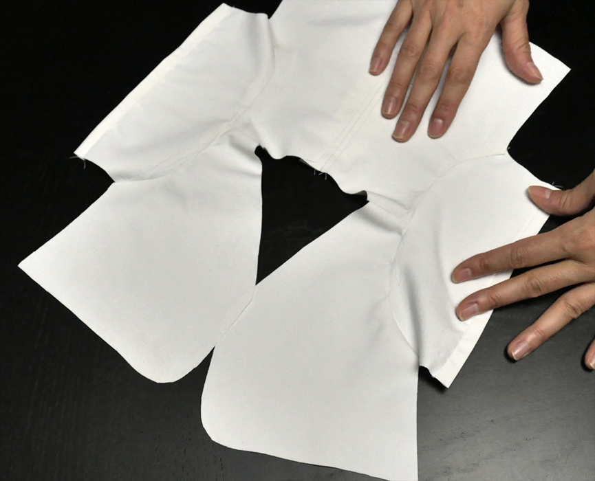Now use the edge of each cuff to guide you in preparing the side seams.
