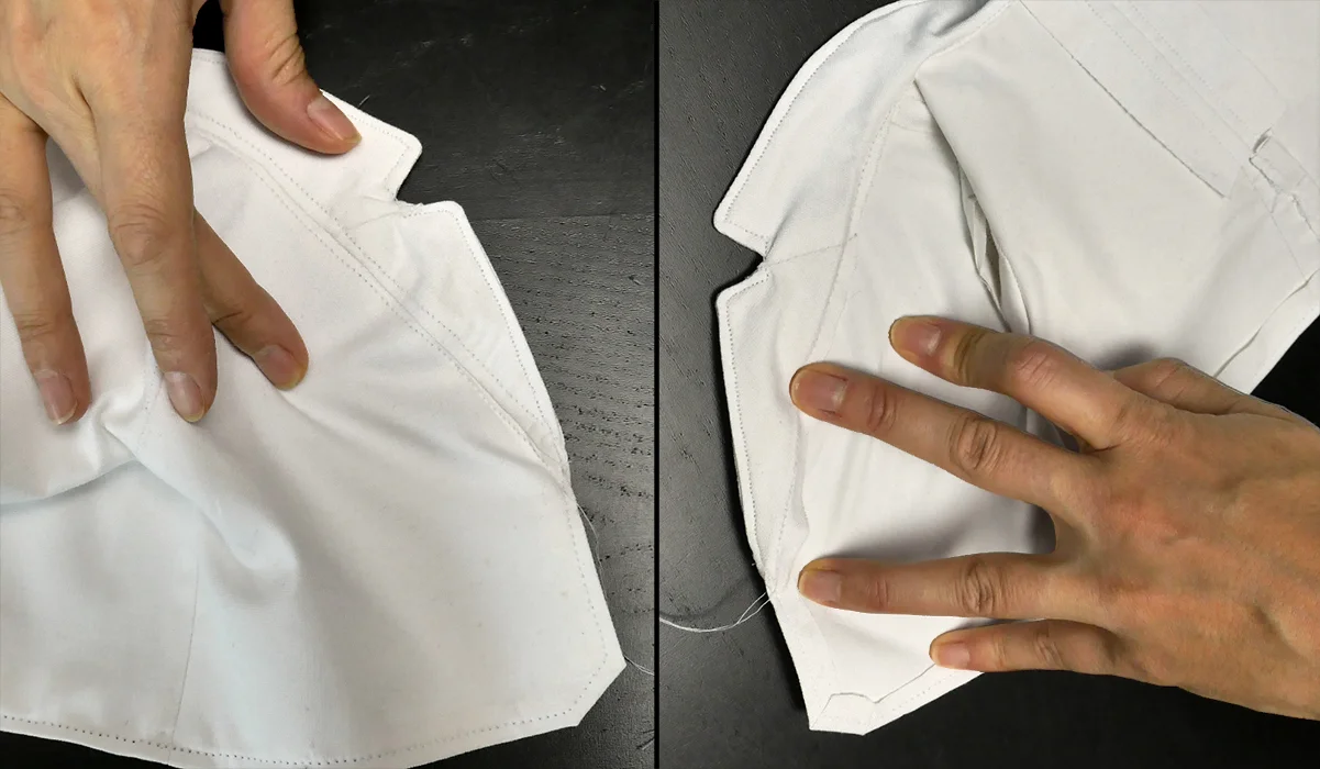 On the "underside" of your lapel, there are two rows of topstitches visible, but the lapel itself will hide these once it's laying down properly. On the "good side" of your lapel, there is a single row of topstitches along the inside (or "wrong" side) of the neckline. So these will not be visible, either, once your Build-A-Bear is wearing this suit coat, blazer, or jacket.