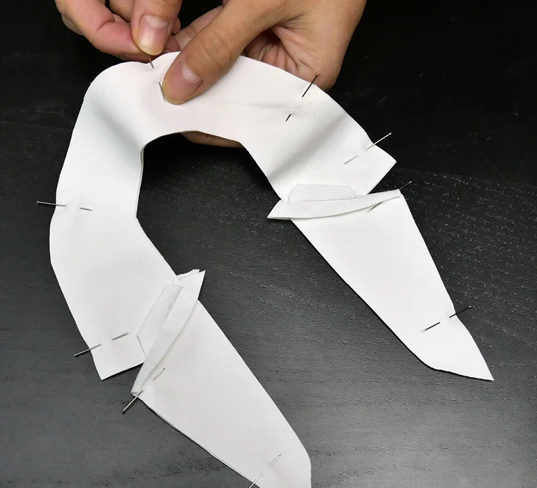 Line up both sides of your lapel so that the seams meet in each corner. Pin to secure.