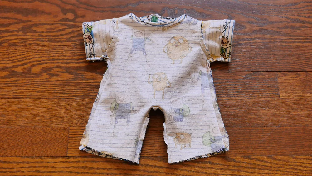 You should not have hemmed the pant legs if you plan to add footies!