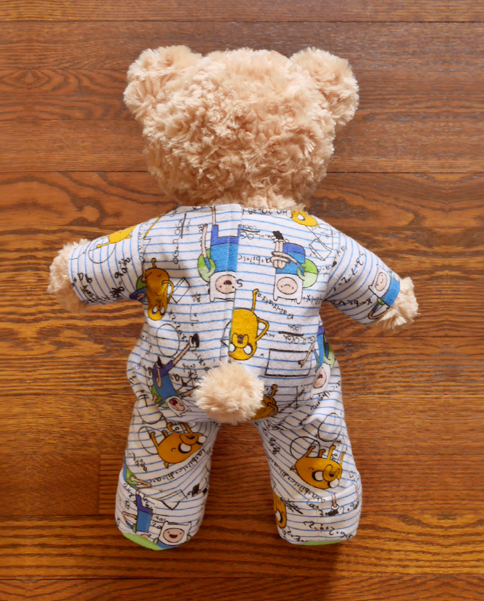A finished pair of BAB Footie Onesie Pajamas, as seen from the back.