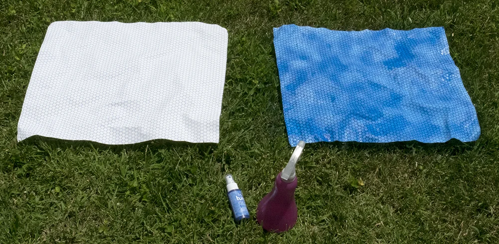This photo was taken while the dye (on the right) was still wet. Both pieces of fabric were cut from the same bolt, originally; a simple white cotton fabric with a geometric pattern printed on it in white, probably a silk-screen ink.