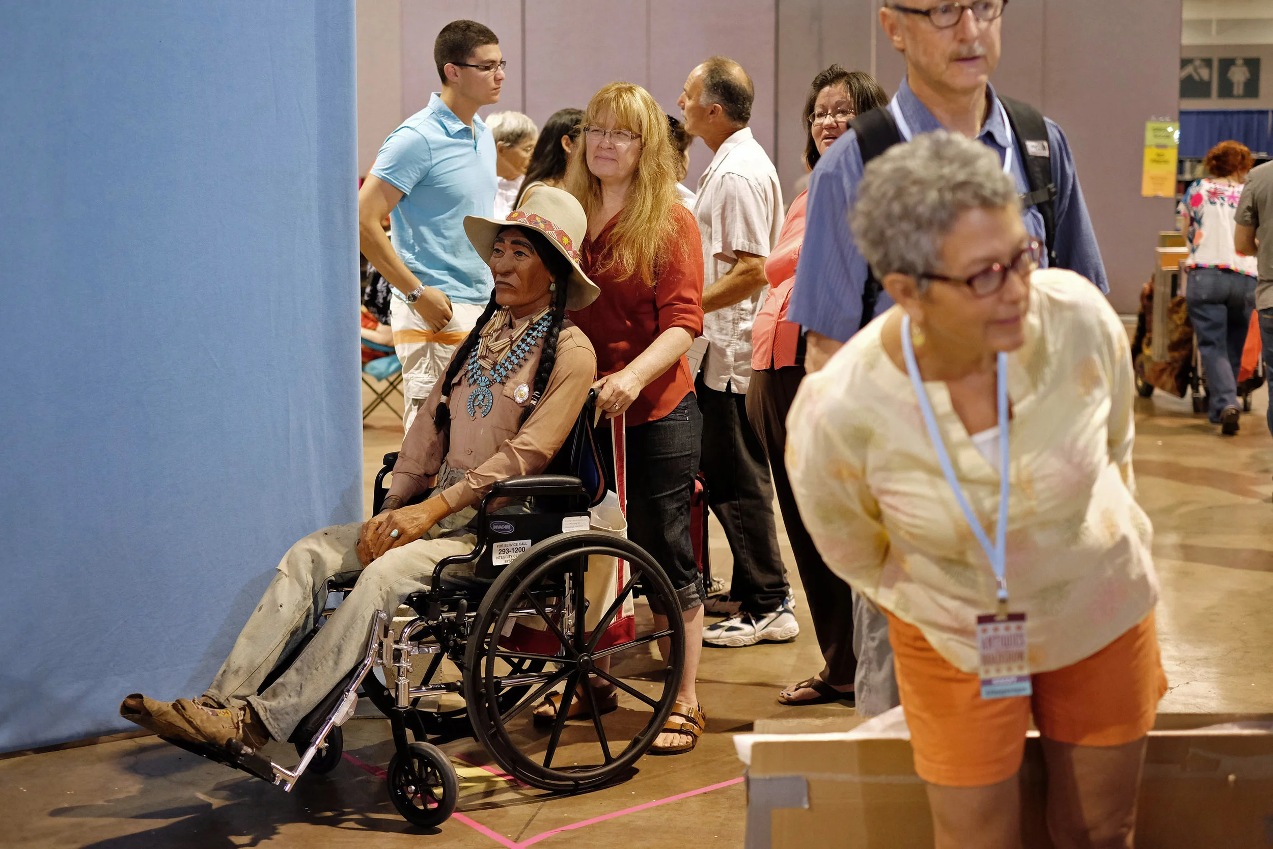 Mary, of Albuquerque, waits patiently with Joe, her antique life-sized Native American figure, at Antiques Roadshow at the Albuquerque Convention Center, July 19, 2014, in Albuquerque NM. Joe previously could be seen at the former Turquoise Lady in Old Town from approximately 1975 until 2000, according to Mary. (Morgan Petroski/Journal)