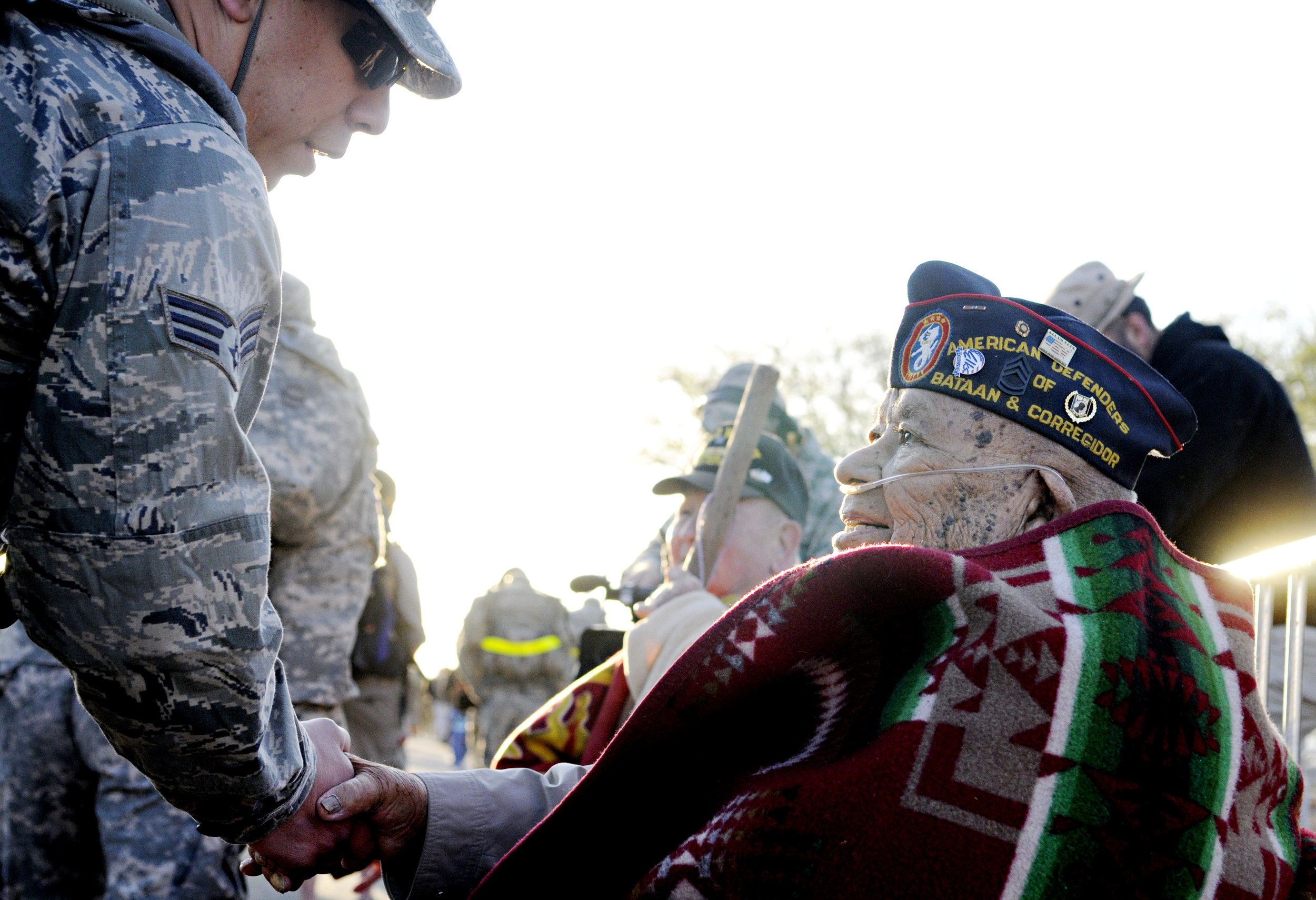  Bataan survivor Sam Juan Antonio, sends off the walkers with the phrase "No Blisters" during the 22nd Annual Bataan Memorial Death March at White Sands Missile Range, Sunday, March 27, 2011. (Morgan Petroski/Albuquerque Journal) 