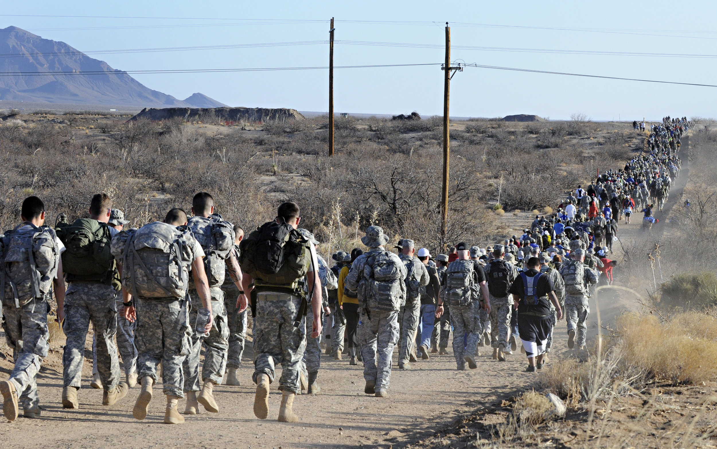  Walkers hike through the White Sands Missile Range during the 22nd Annual Bataan Memorial Death March, Sunday, March 27, 2011. (Morgan Petroski/Albuquerque Journal) 