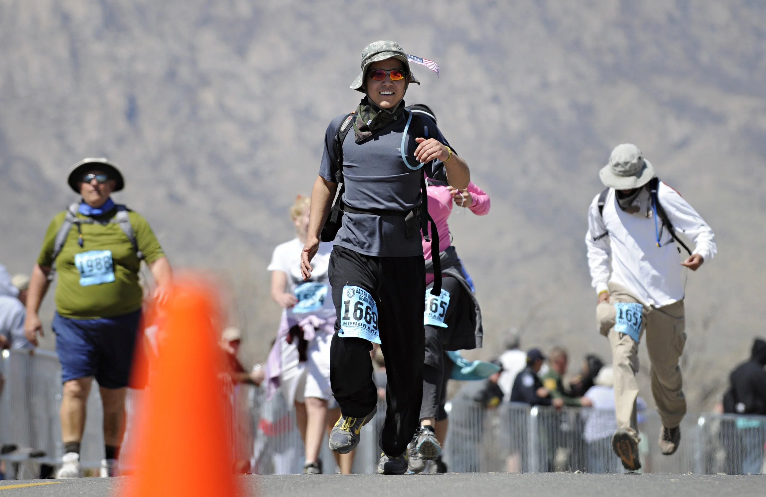 A runner comes down the home stretch of his 15.2-mile run during the 22nd Annual Bataan Memorial Death March at White Sands Missile Range, Sunday, March 27, 2011. (Morgan Petroski/Albuquerque Journal)