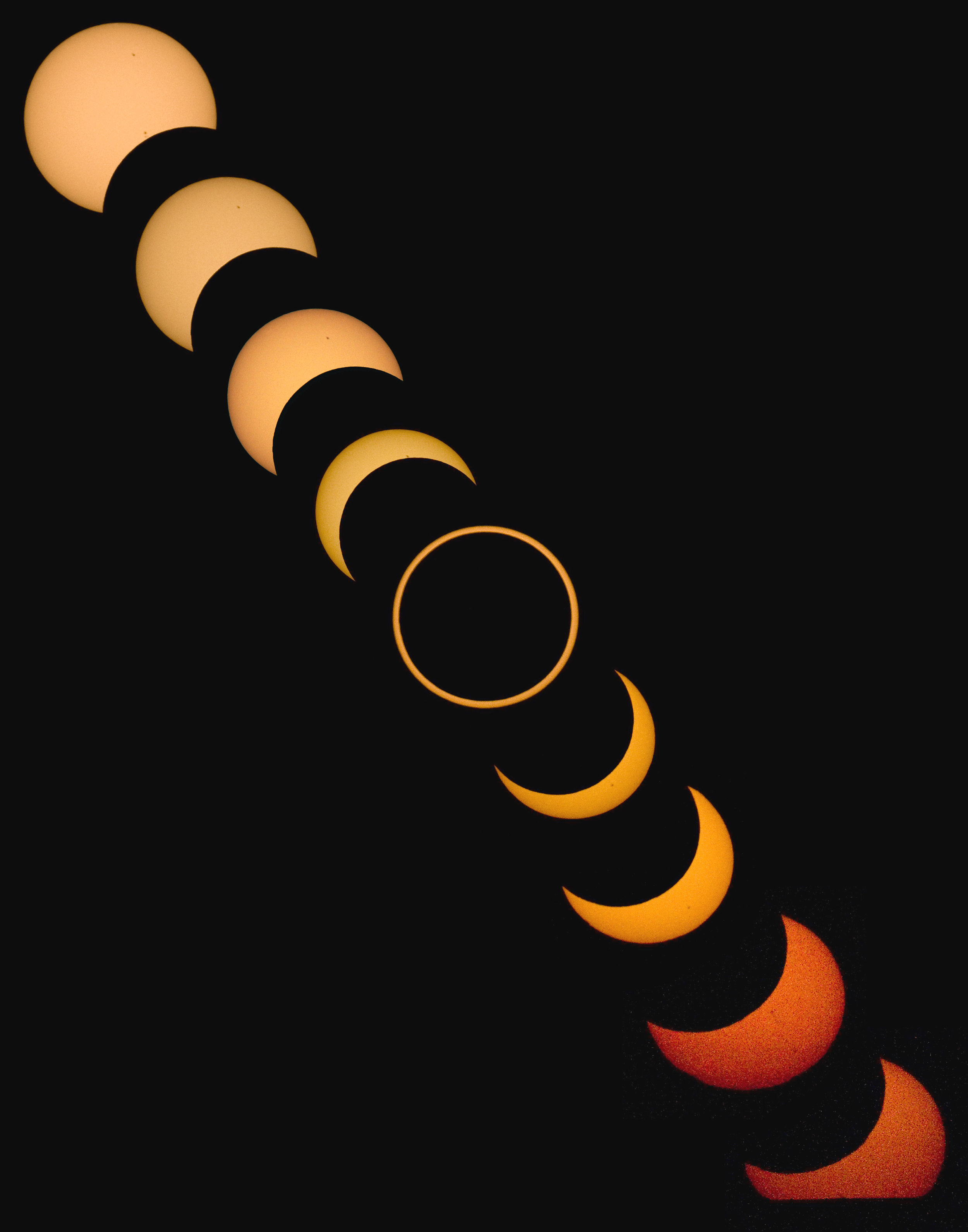  An assembled image of the annular solar eclipse as viewed from Albuquerque, NM, Sunday, May 20, 2012. At bottom right, near the end of the eclipse, the sun was setting below the horizon, which is the reason it is cut off along the bottom. (Morgan Pe