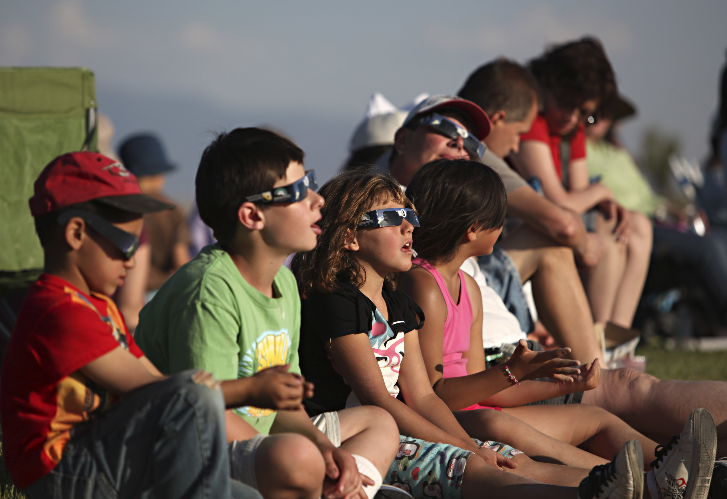  Children watch the annular solar eclipse during a viewing party near the Hard Rock Casino Presents the Pavilion, Sunday, May 20, 2012, in Albuquerque, NM. (Morgan Petroski/Albuquerque Journal) 