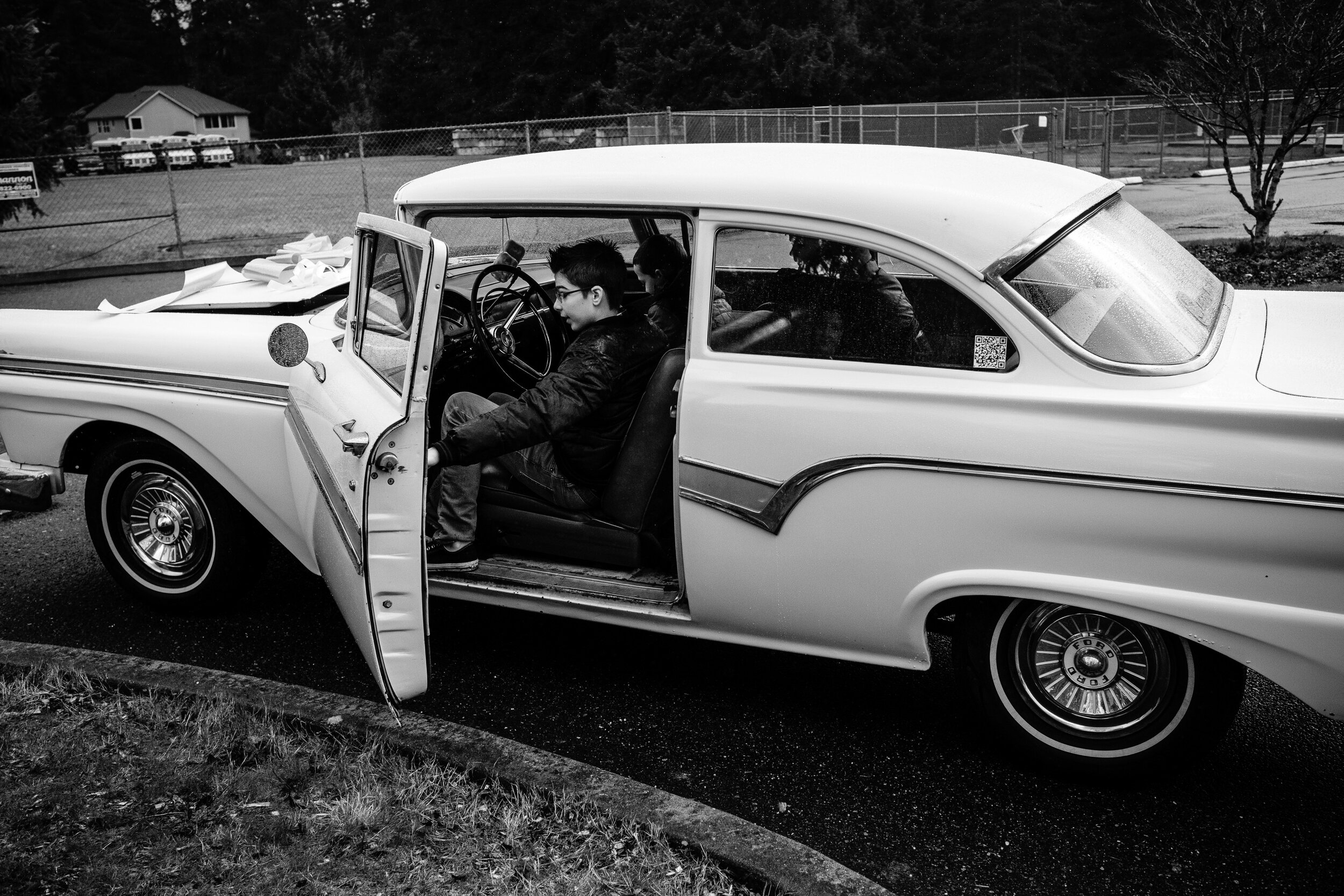 Anthony Schmidt and his new car a 1957 Ford Custom 300 "Betty." Photo by Woodinville family documentary photographer Morgan Petroski.