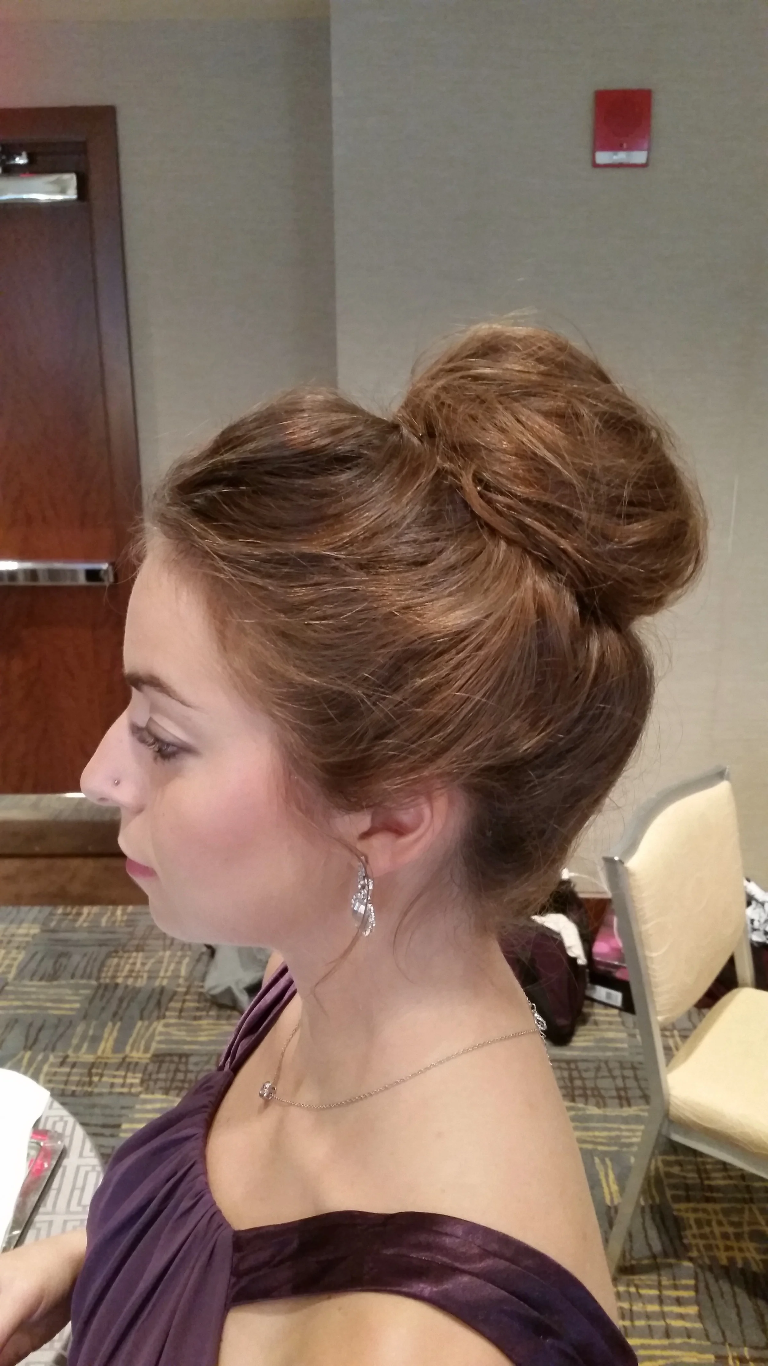 Bridesmaid with a high messy bun
