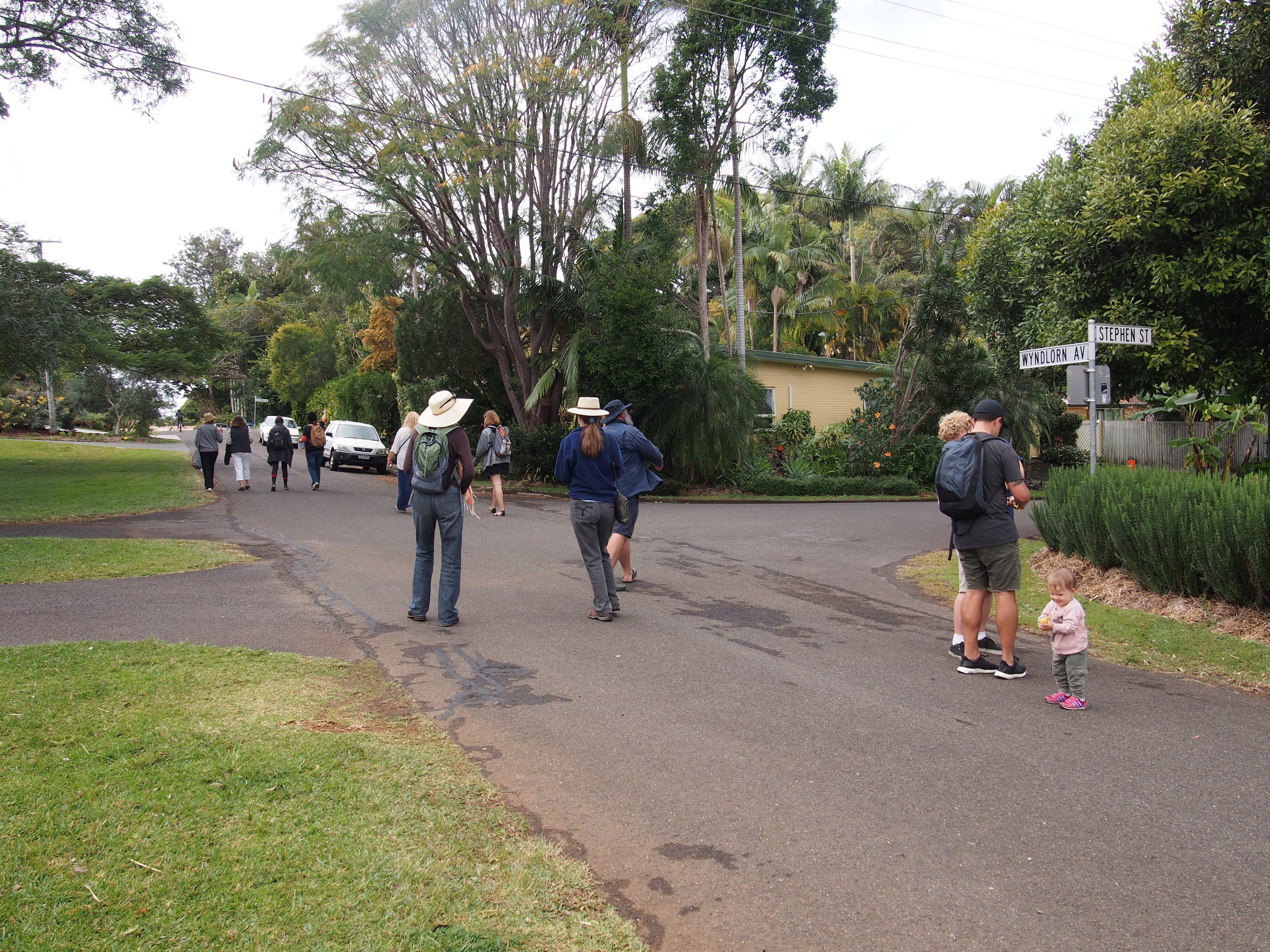 Group of local and international tourists walk the Urban Food Street neighbourhood