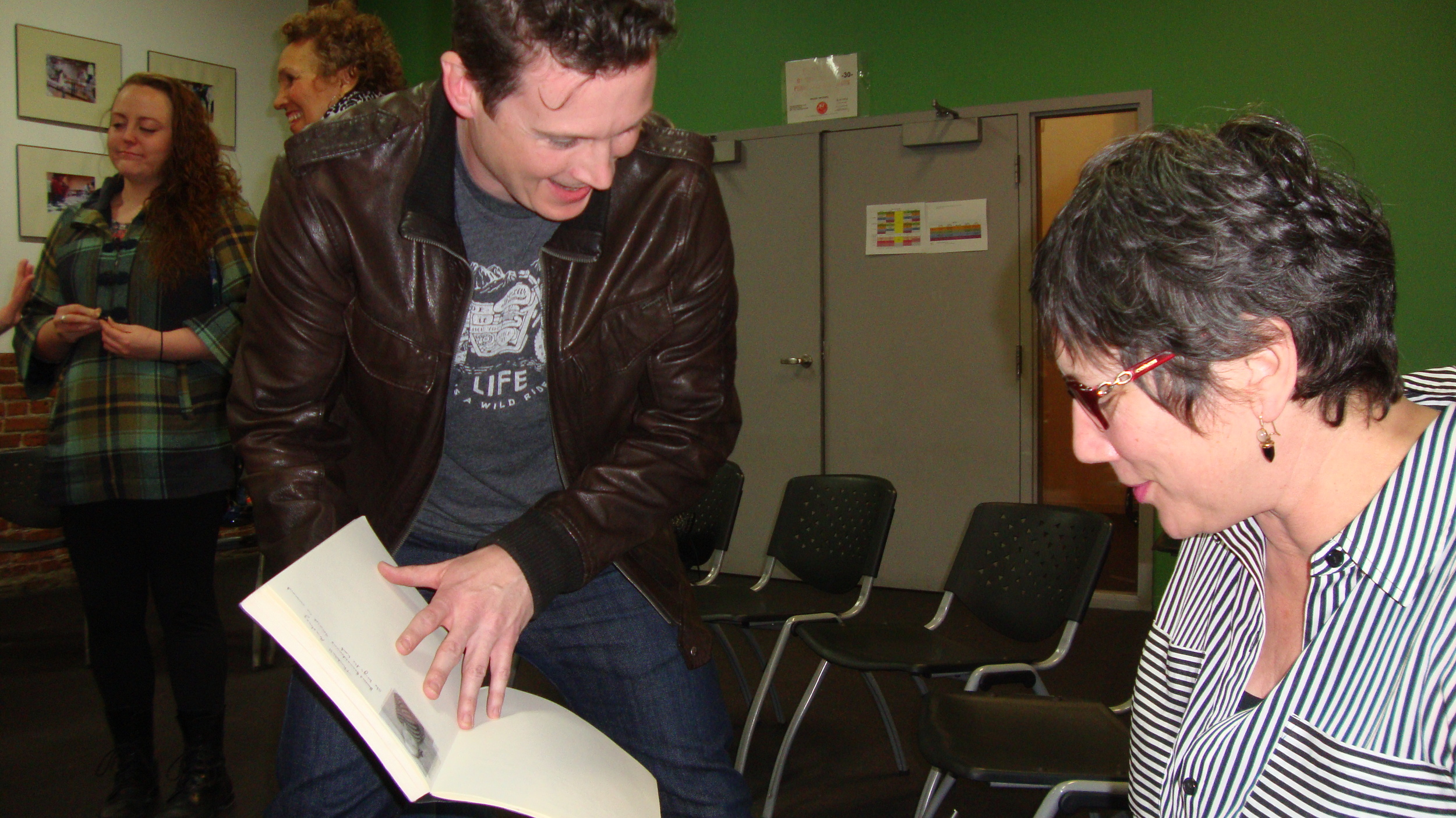 Lawrence shows off his storyboards for Spy Who Knew Me to Jodee