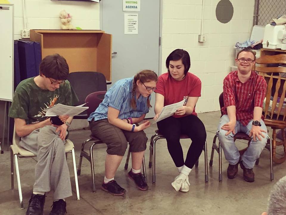 Daisy doing a staged reading with her theatre group at ATCO, a center for adults with disabilities in Athens, Ohio. She used this experience to help her during her time at ABLE.