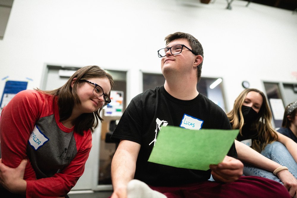  Actor Lucas Miezal holds a green sheet of paper as he shares ideas during a writing session. Actors developed original dialogue and movement pieces for their scenes.&nbsp;-  Photo by Joe Mazza/Brave Lux  