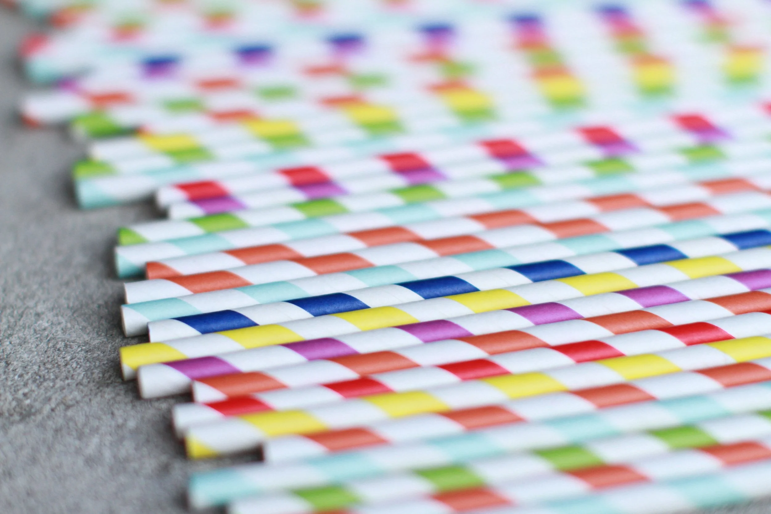 Multi colored paper straws.