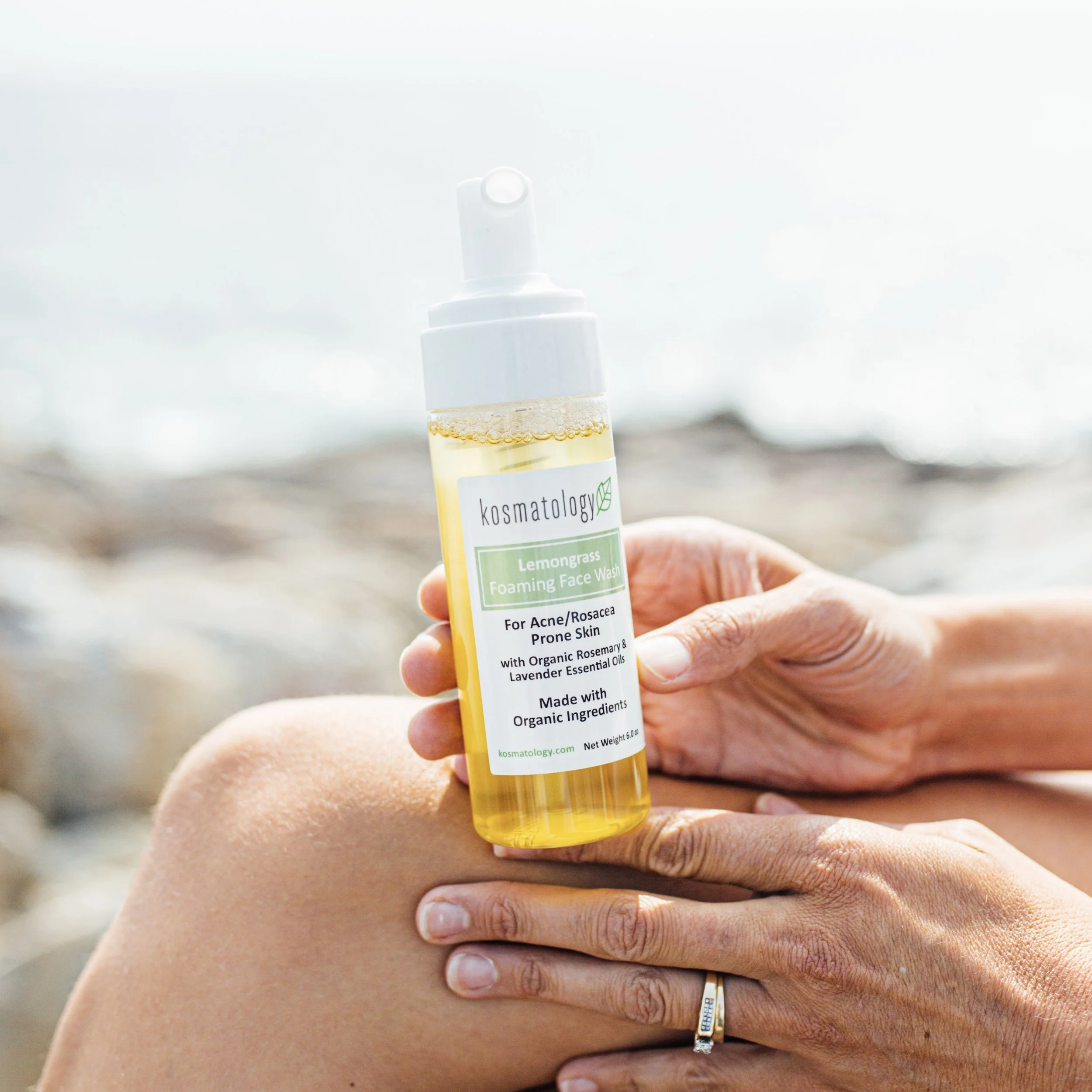 Kosmatology Lemongrass Face Wash for Acne Prone skin on a beach