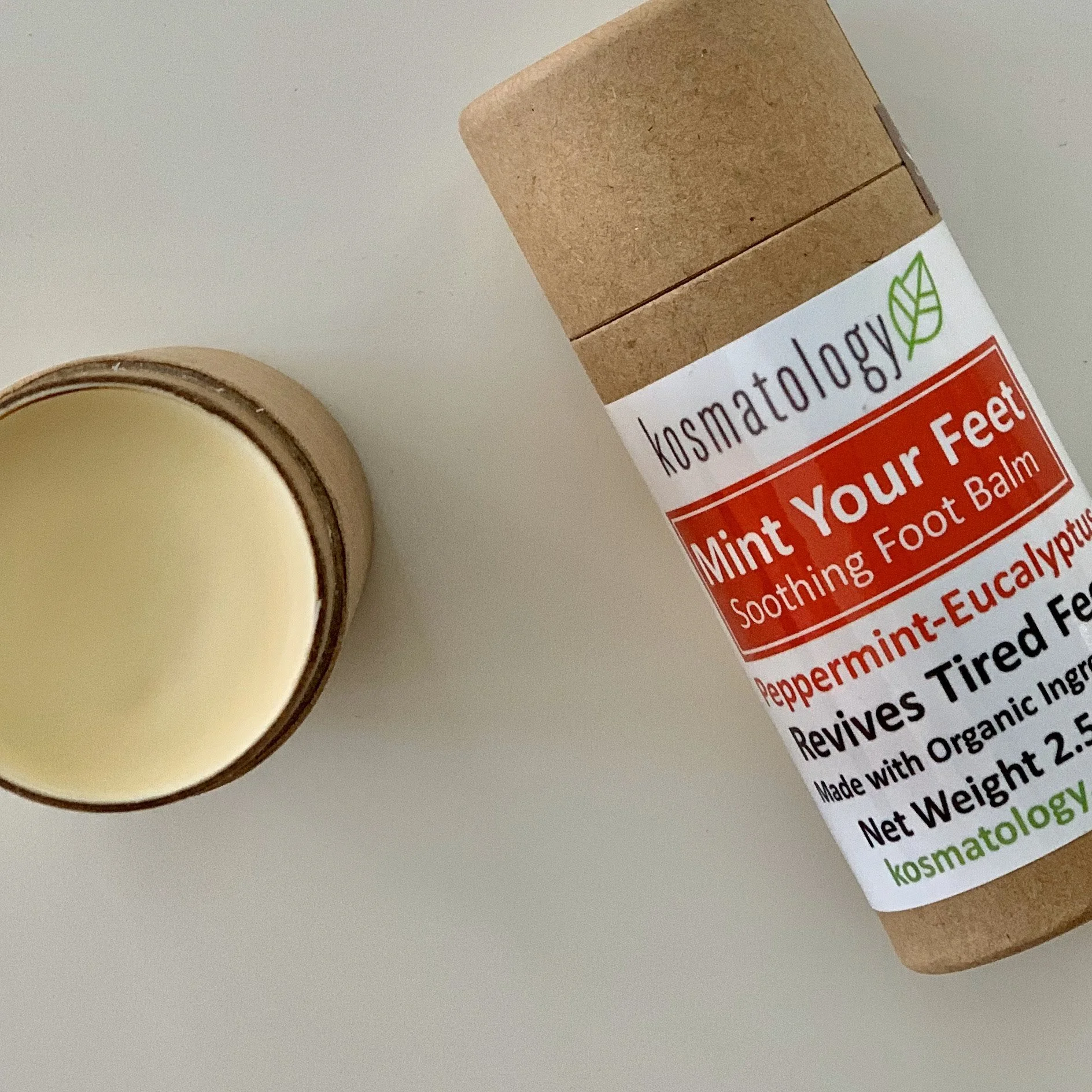 Mint Your Feet Foot balm up close picture with the balm open to see smooth consistency.