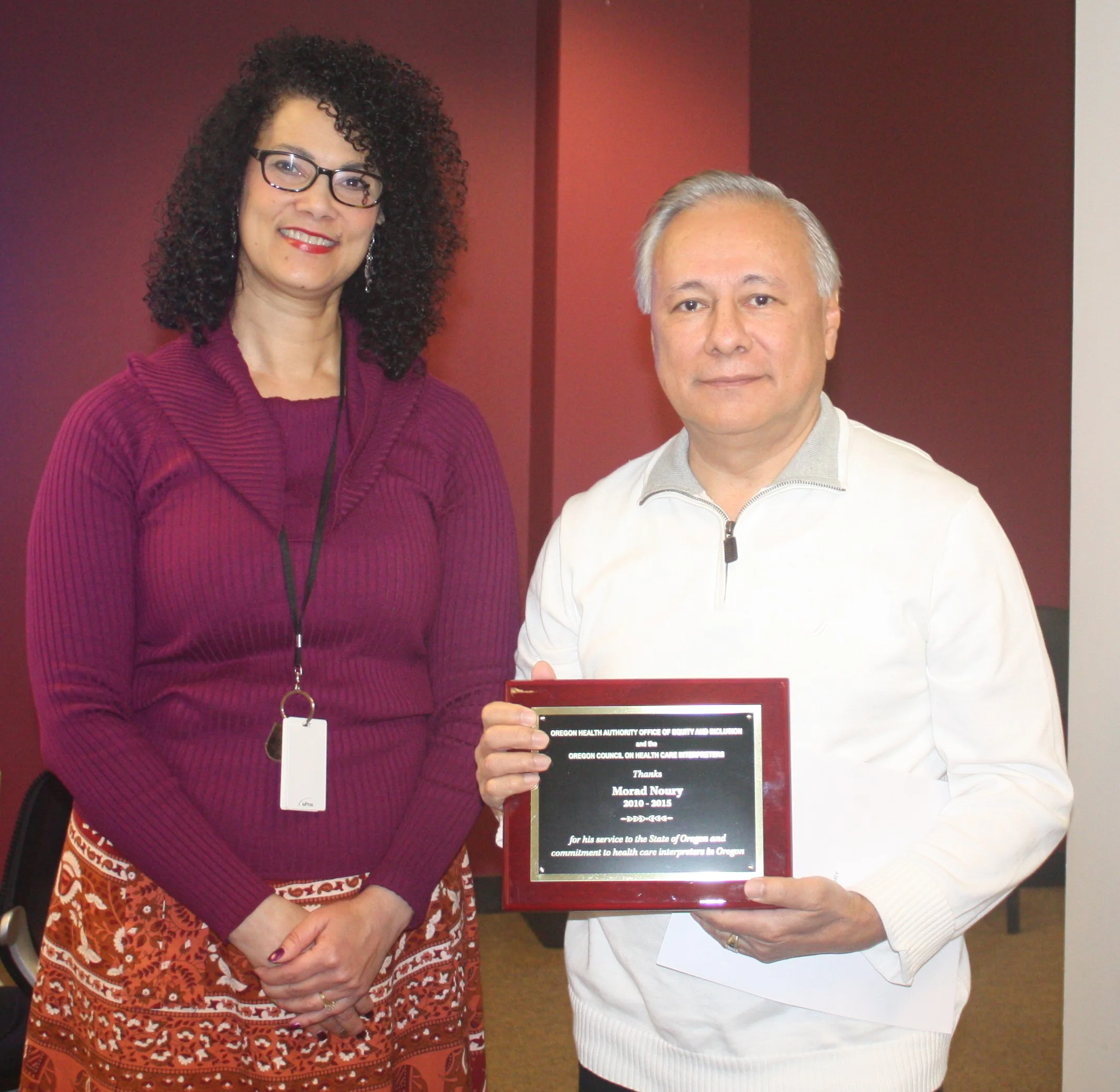 OHCIA Board Member Dr. Morad Noury posing with the Oregon Health Authority Office of Equity and Inclusion Director Leann Johnson after receiving the award on March 14th, 2016.