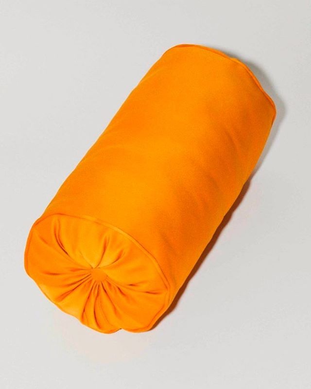 U can sit on me 🧡 Roll pillow in Silk duchesse satin 📸 by @krisdesmedt_photography #orangeisahappycolour #wimbruynooghe #duchessdemafesse