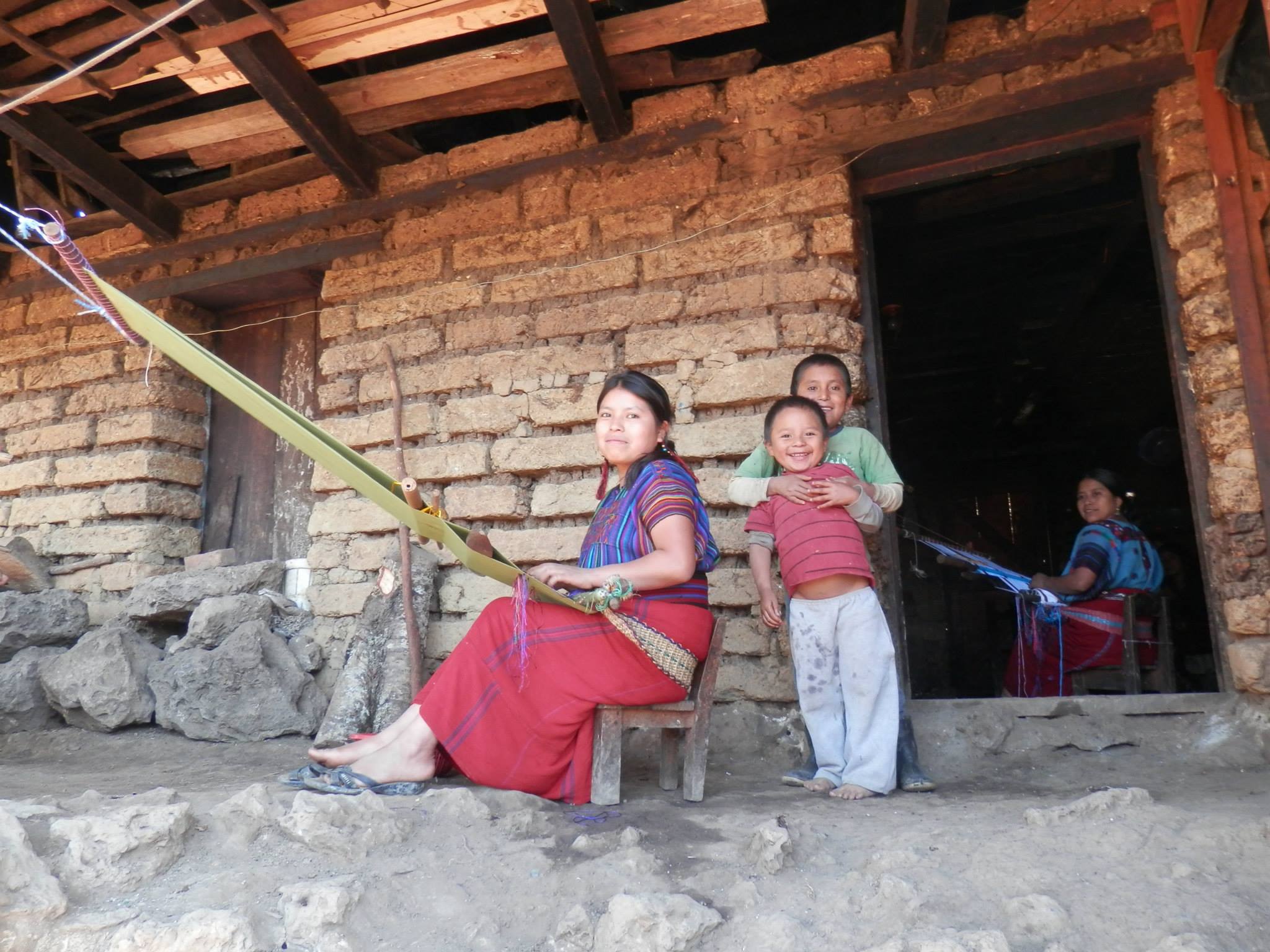 Mayan women working on their backstrap looms near Nebaj, K'iche, Guatemala in 2013. Photo: Madretierra Sato