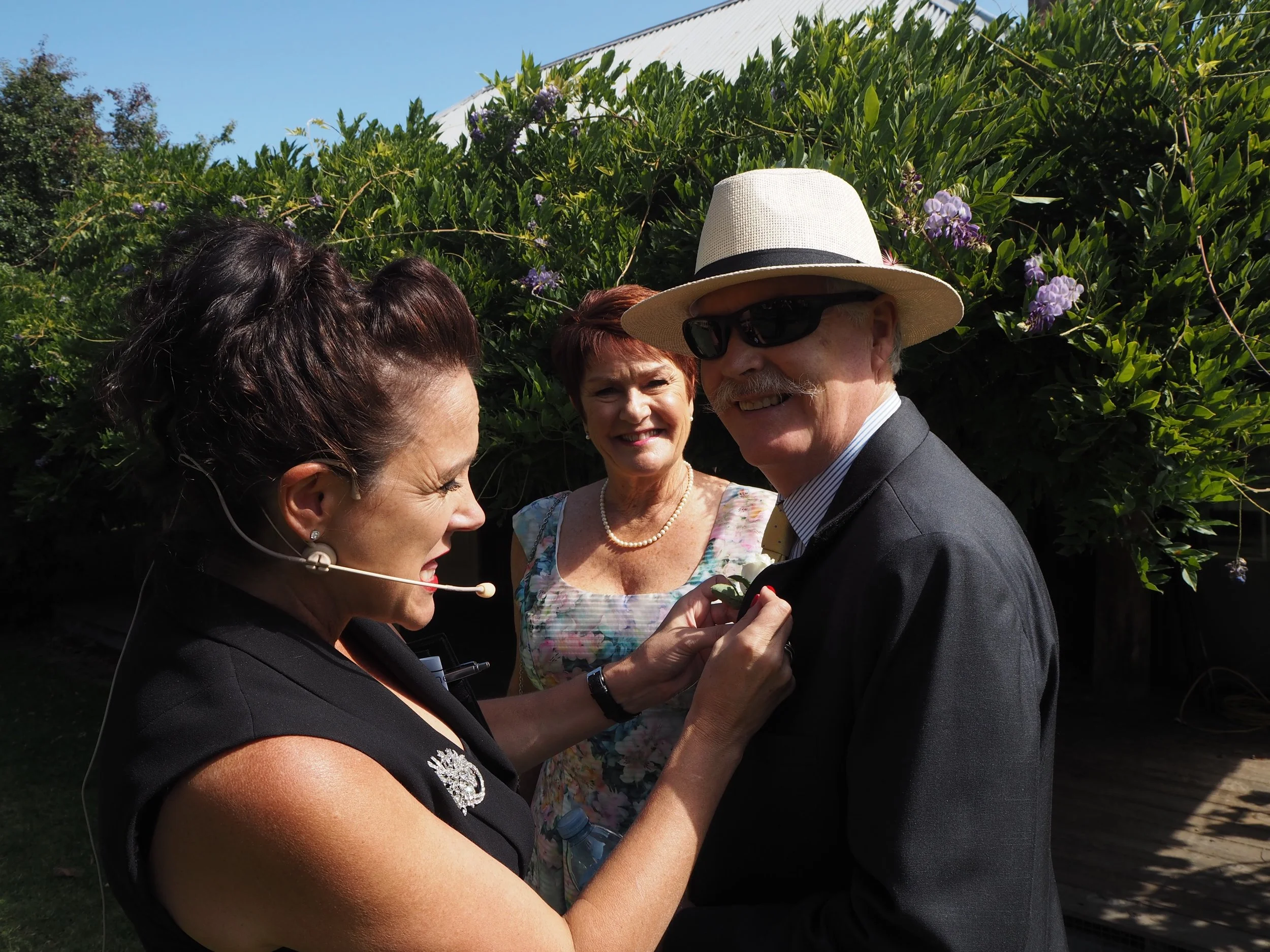 Helping with the buttonholes