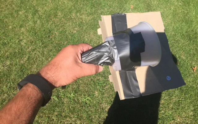 My light paintbrush: Ikelite underwater flashlight, diffuser, and cardboard to deflect light away from the lake surface.