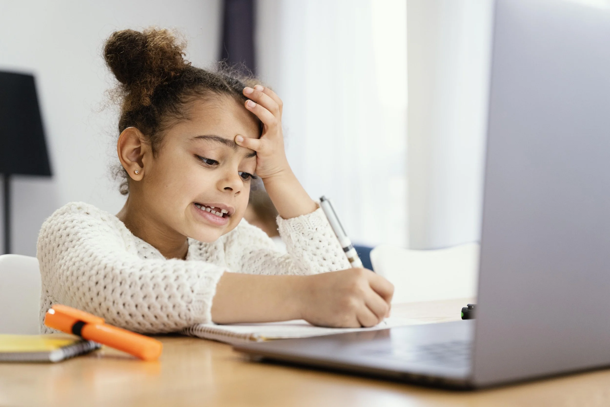 worried-little-girl-home-online-school-with-laptop.jpg
