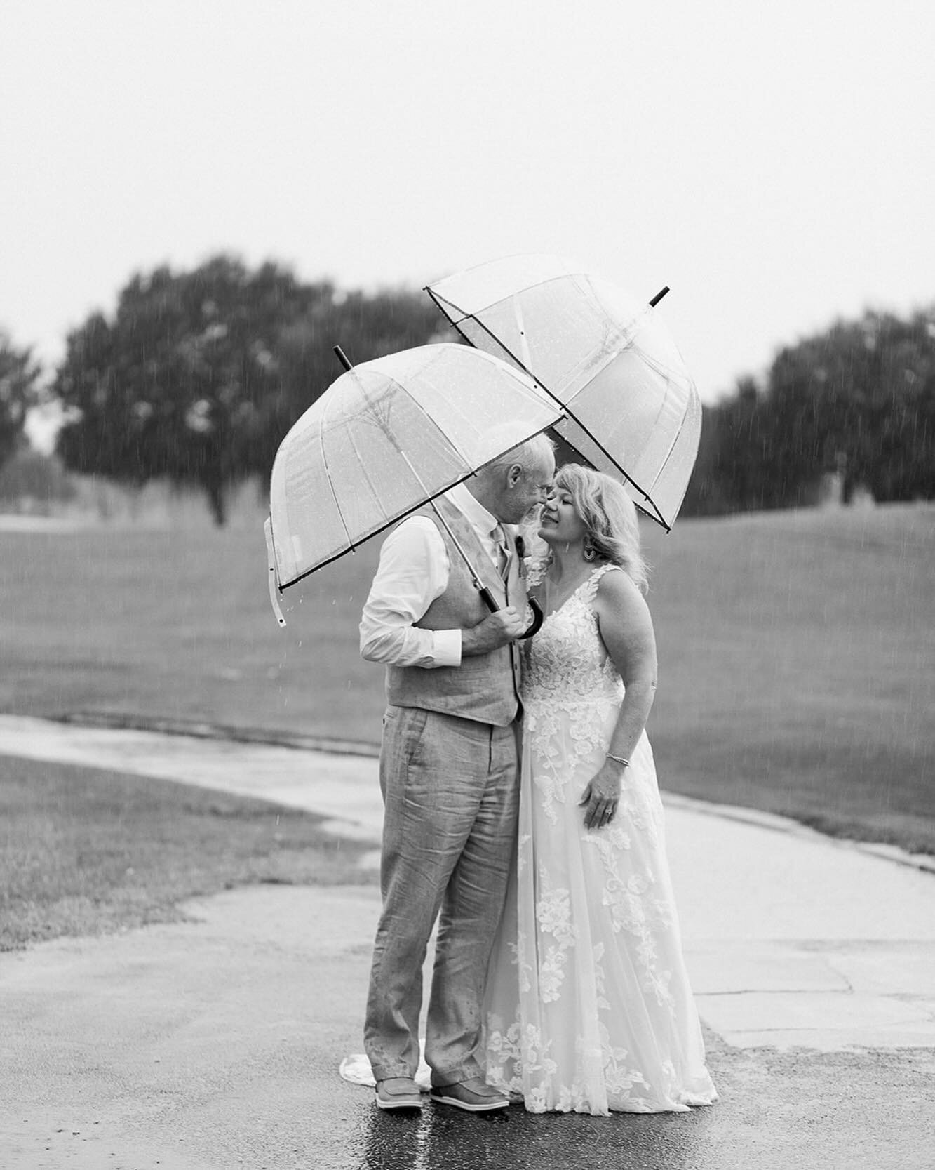 I completely understand how you feel about rain on your wedding day. It's not what most people envision for their special day. 

However, rain makes for some gorgeous and romantic photos❣️

Some of the most stunning and memorable wedding photos have 