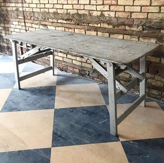 Good profile on this sturdy vintage Army folding table.  Painted silver probably fifty or sixty years ago, a bonus feature imho.  69&rdquo; x 28&rdquo; x 28&rdquo; $450 includes GTA delivery