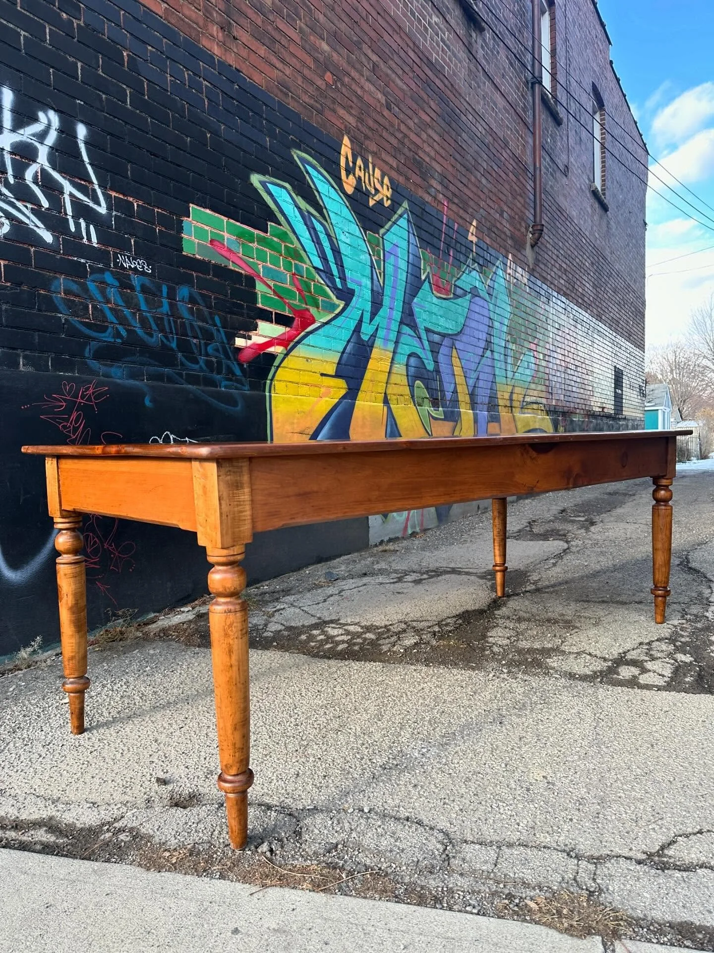 A new but very nicely made and properly proportioned pine harvest table.  Some good attention to detail including a horizontal stretcher on the underside and a chamfer to the bottom of the apron.  24&rdquo; apron height and a couple of inches of over