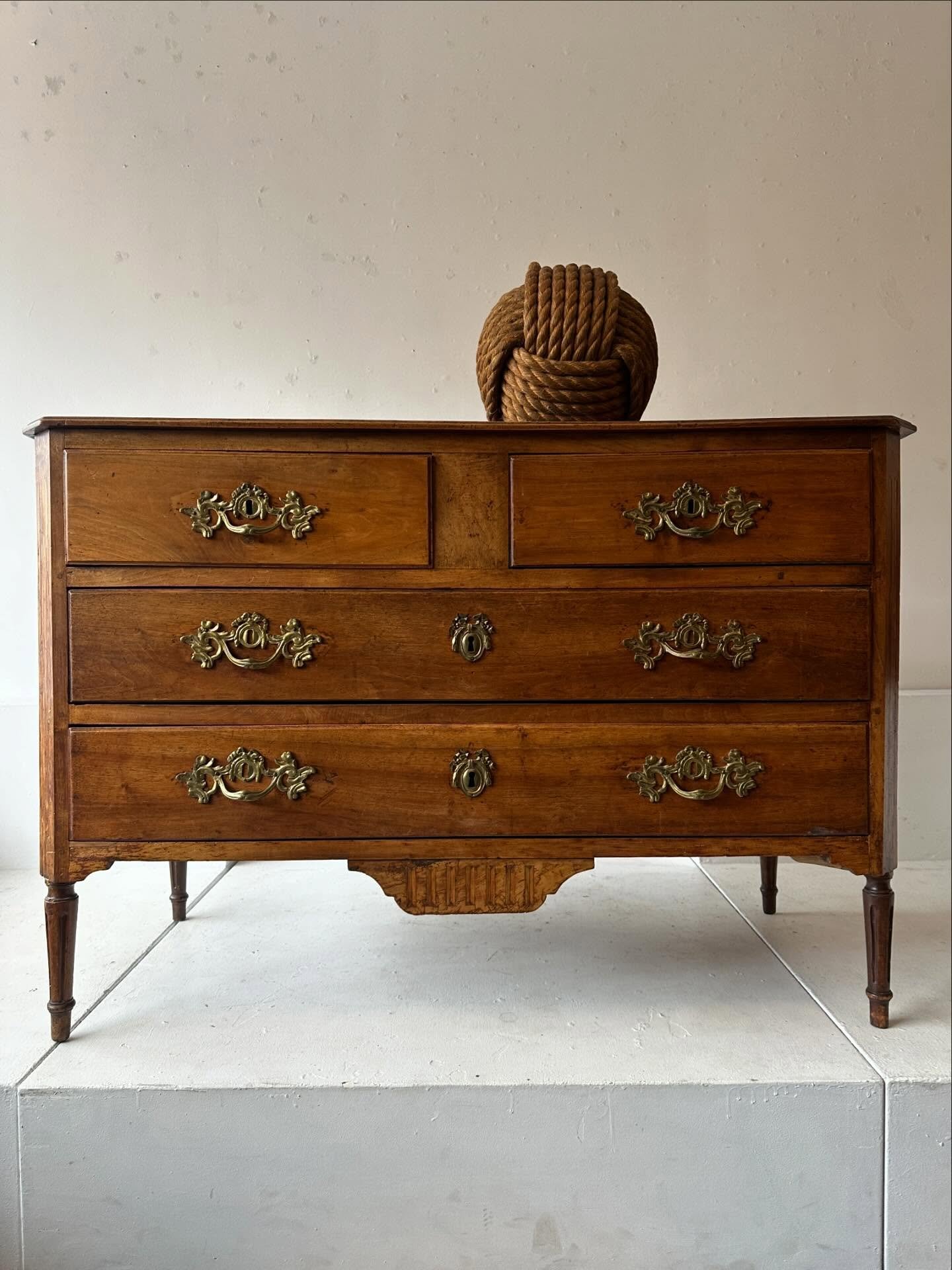 Great presence to this early to mid 19th century French commode.  Original bronze hardware, fruitwood inlay, good tidy and working drawers.  Some loss to the bottom of one back foot not visible from front (shown in last slide)&hellip;50 1/2&rdquo; wi