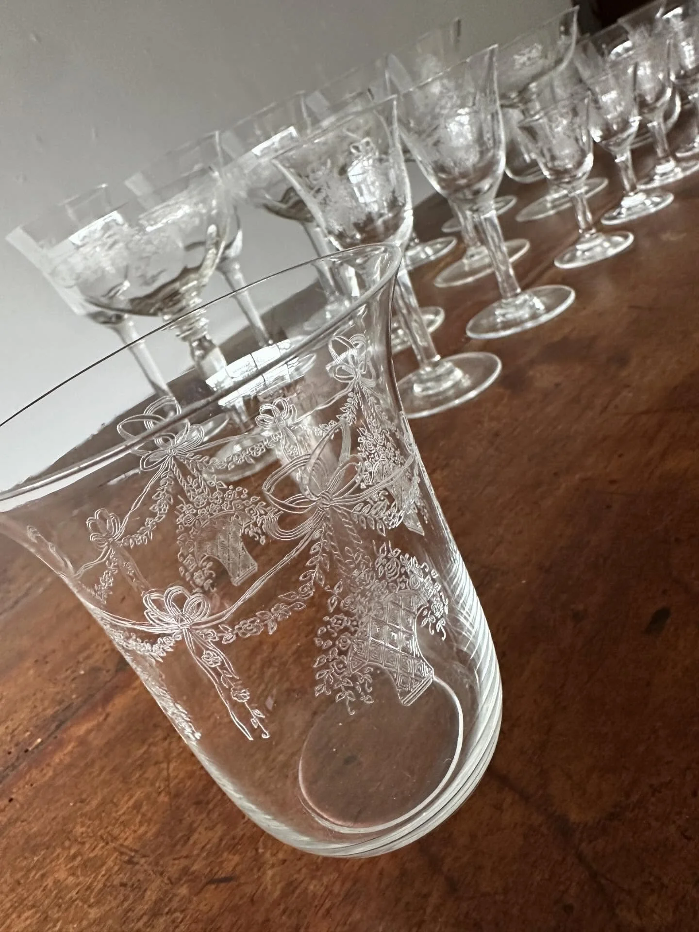 Good morning! A grouping of very nice quality antique stemware and other glasses.  TWENTY PIECES..Six various forms in multiple.  I&rsquo;m not versed in the nomenclature of form types (coupes etc) but all have the same etched pattern.  Last slide sh