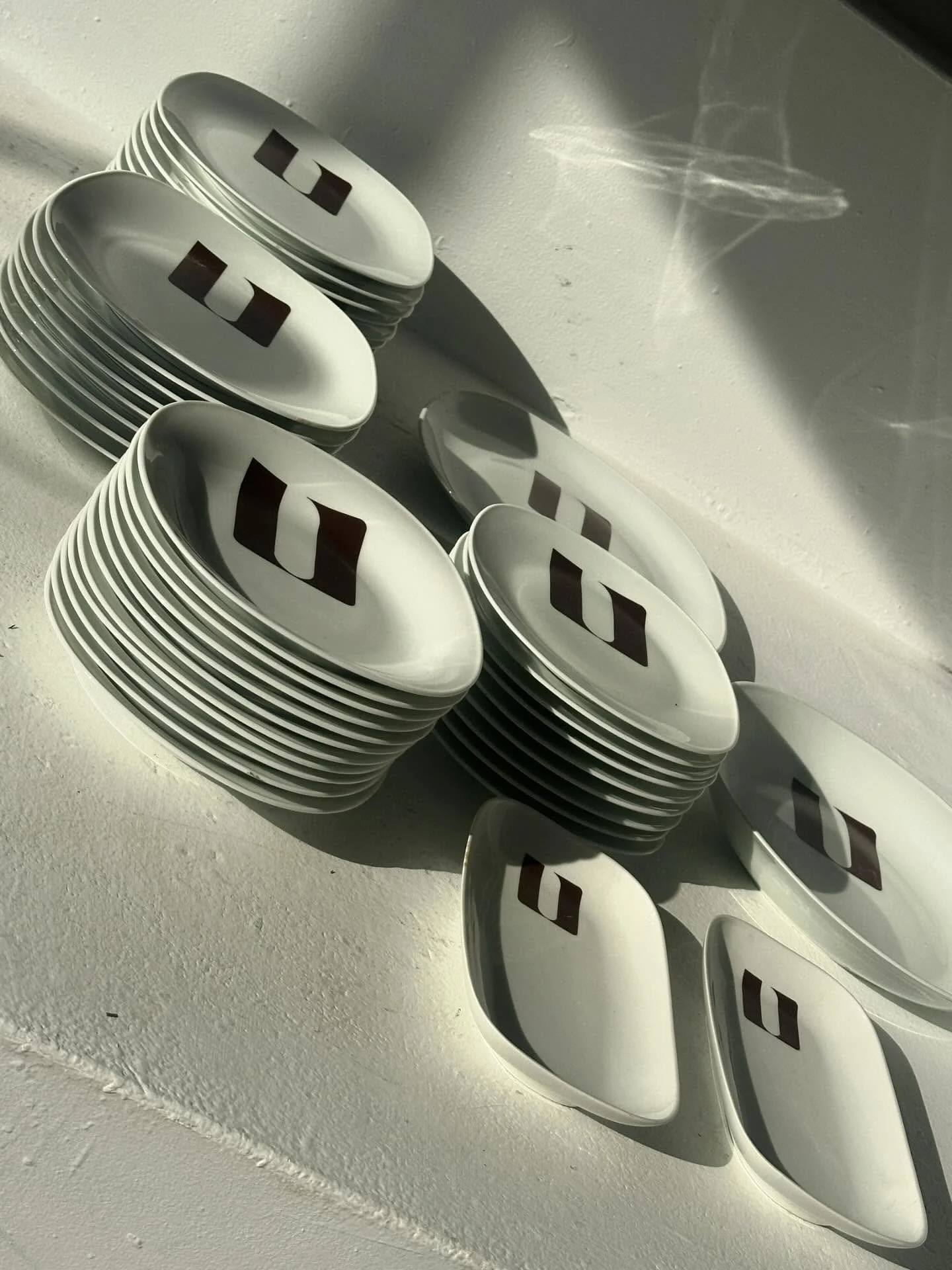 Good morning! Very stylish collection of 70s French modernist porcelain tableware for Georges Boyer, Limoges.  Simple, striking, very graphic design.  41 PIECES total, comprised of eleven 8 1/4&rdquo; shallow bowls, eight 9 1/4&rdquo; plates, another