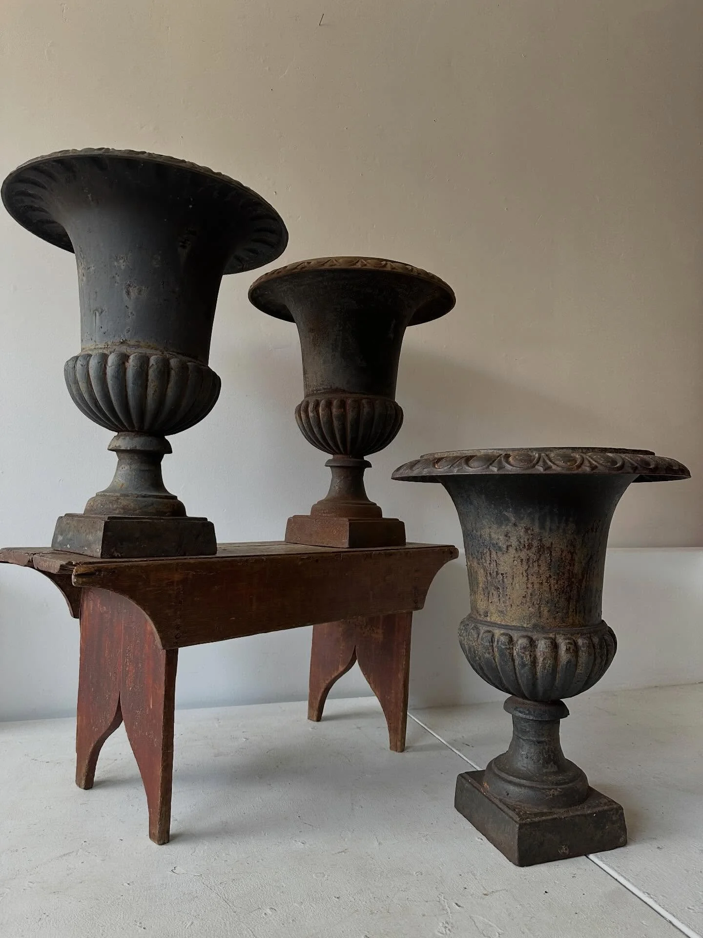 Three matching cast iron garden urns.  All with good age and patina and egg-and-dart decoration.  24 1/2&rdquo; high, 19&rdquo; diameter&hellip;🌿*ALL SOLD