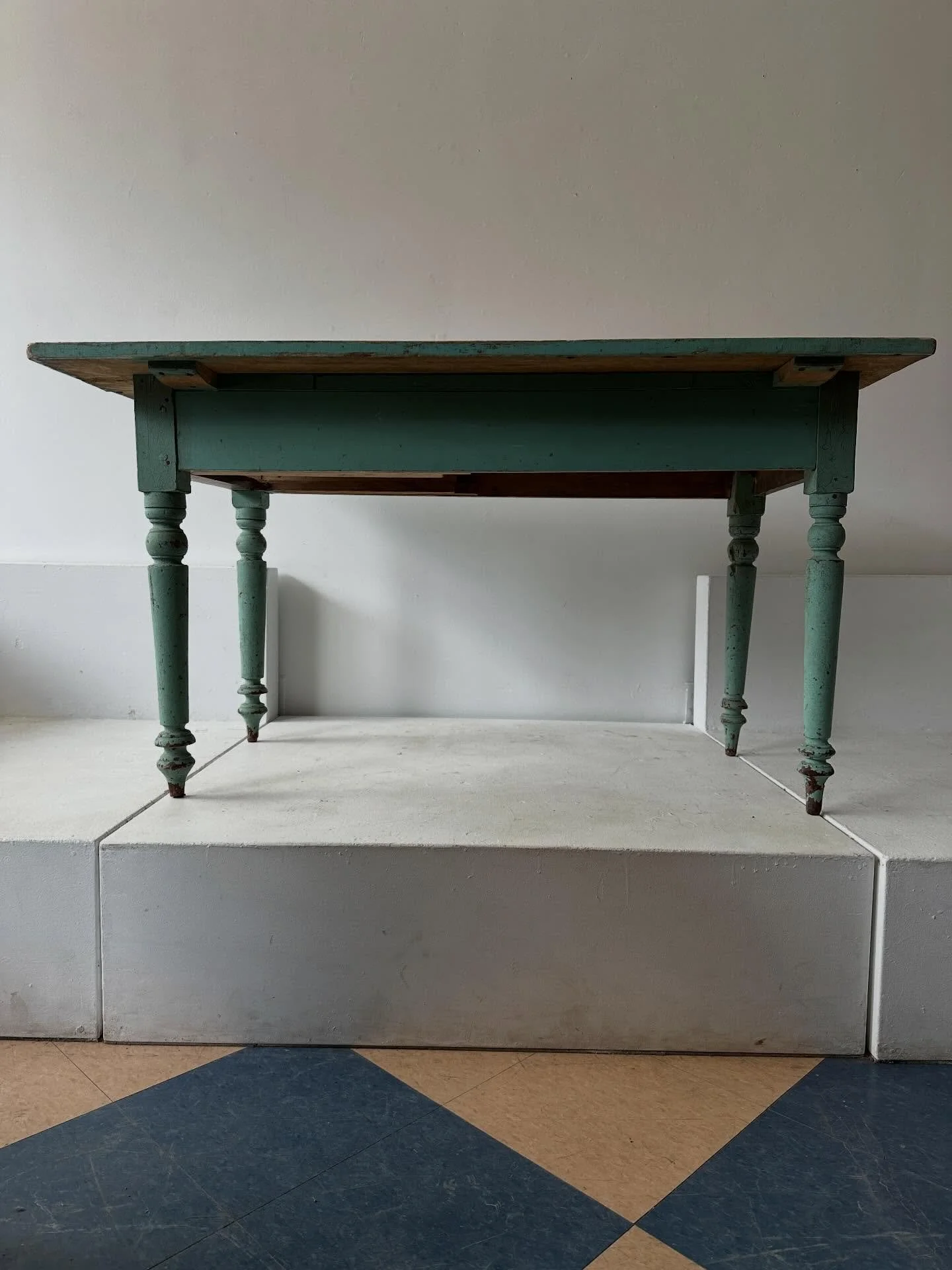 Very pretty 19th century Ontario farm table in crackly old seafoam green paint.  Single drawer.  Nice large overhang on the sides.  The top was stripped a long time ago, though the edges were left alone&hellip;there is ample room for chairs and legs 