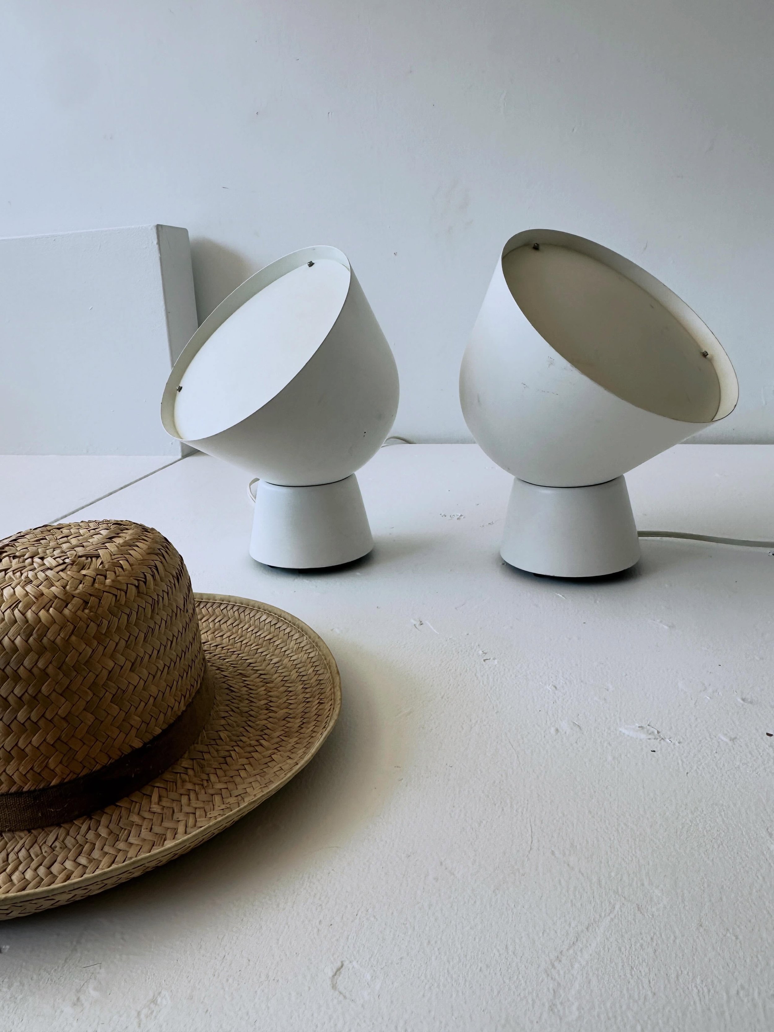 Pair of very stylish lights by Ola Wihlborg for IKEA.  Very versatile design suited for floor or tabletop or to be hung as wall-mounted pendants&hellip;12 3/4&rdquo; high..metal and acrylic&hellip;switches on cords&hellip;$225 plus HST the pair inclu