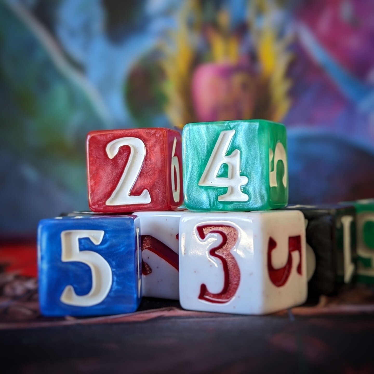 What dice do you find super satisfying to hold? Does color affect your feeling?  These are the ones for Valeria Card Kingdoms. For me, the size and chunk is really wonderful. Also, the seafoam green ones are my favorite color. Something about rolling