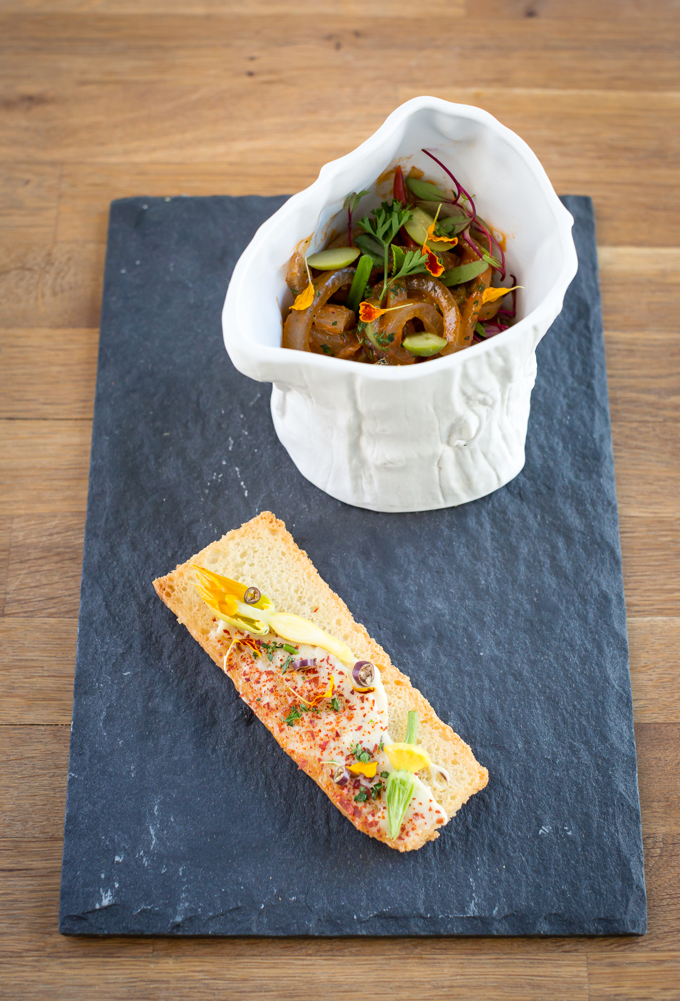 pig skin heirloom tomato/green olive/summer squash/anchovy/fried focaccia