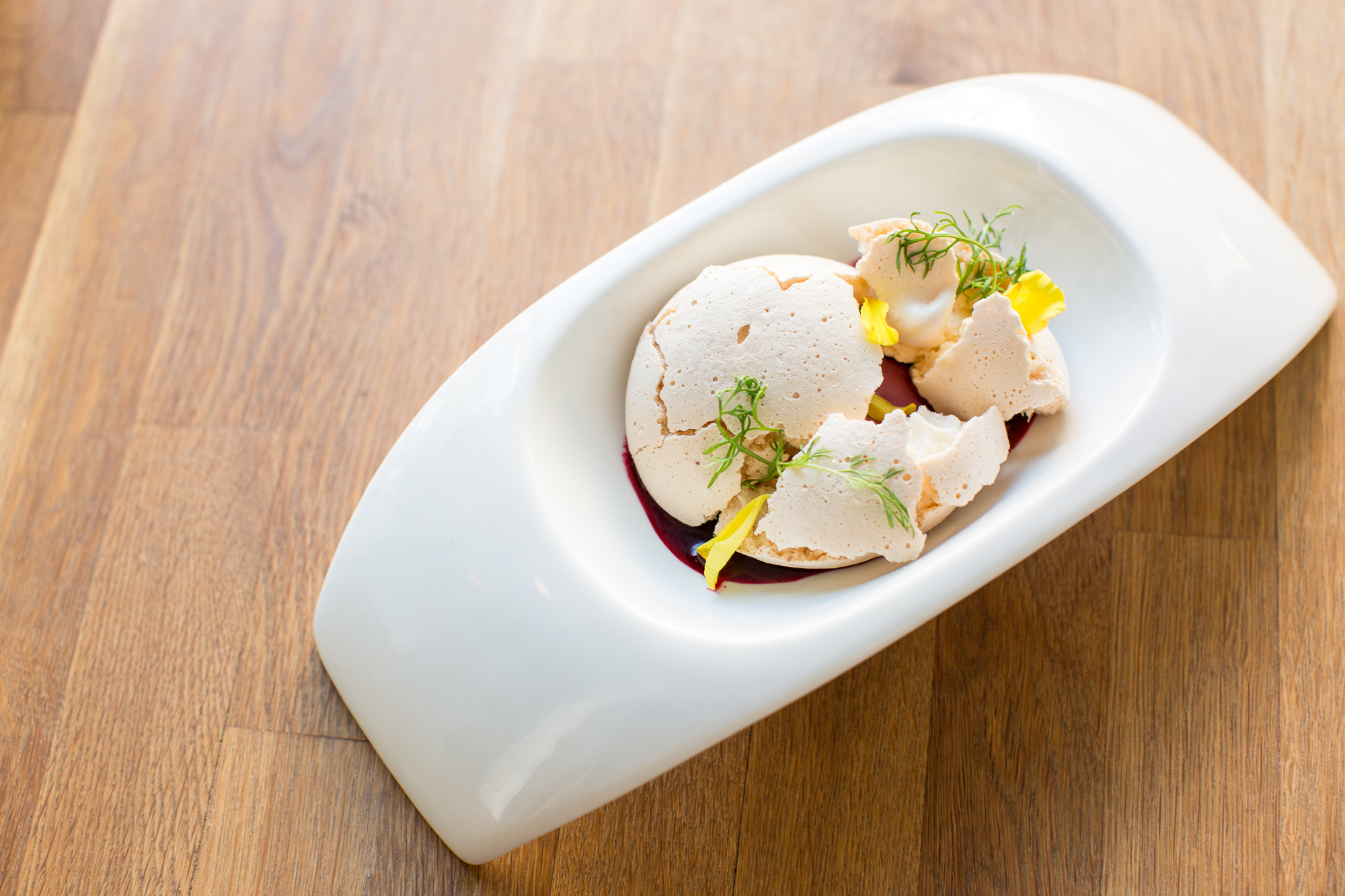 mountain huckleberry vanilla meringue/yuzu/devilwood consomme