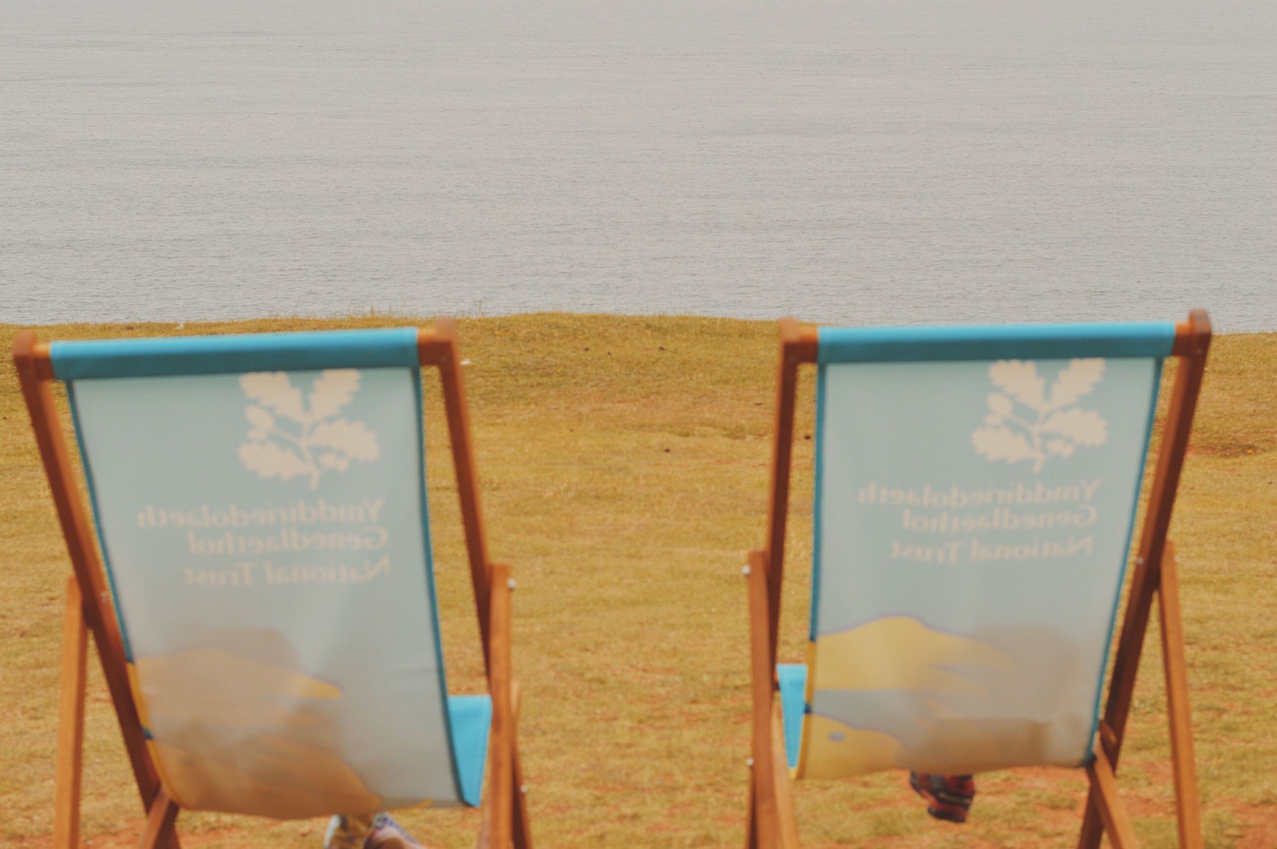 Lounging on the deckchairs at worms head.