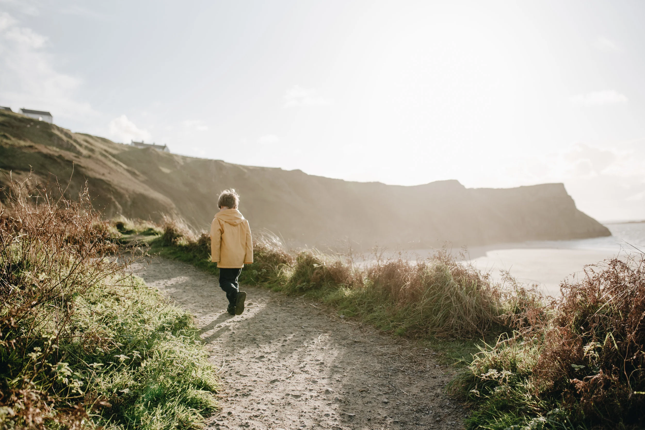 Exploring at Rhossili. Free fun for all the family.