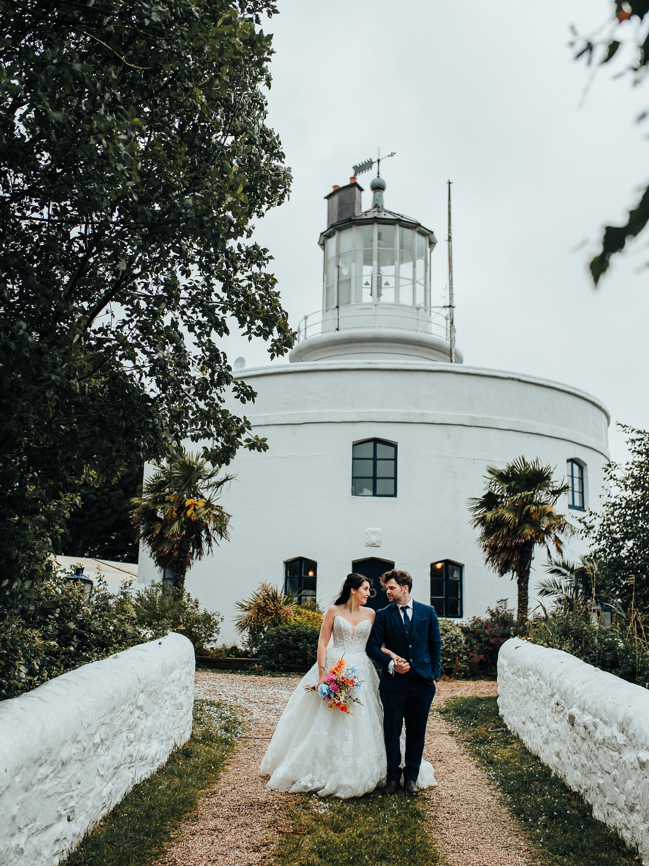 Congratulations Mr and Mrs Williams 🥳 So excited to share these first sneak peeks from Ellen and Greg&rsquo;s wedding on Saturday. They got married at West Usk Lighthouse, and despite torrential rain all day we miraculously got a window of dry weath