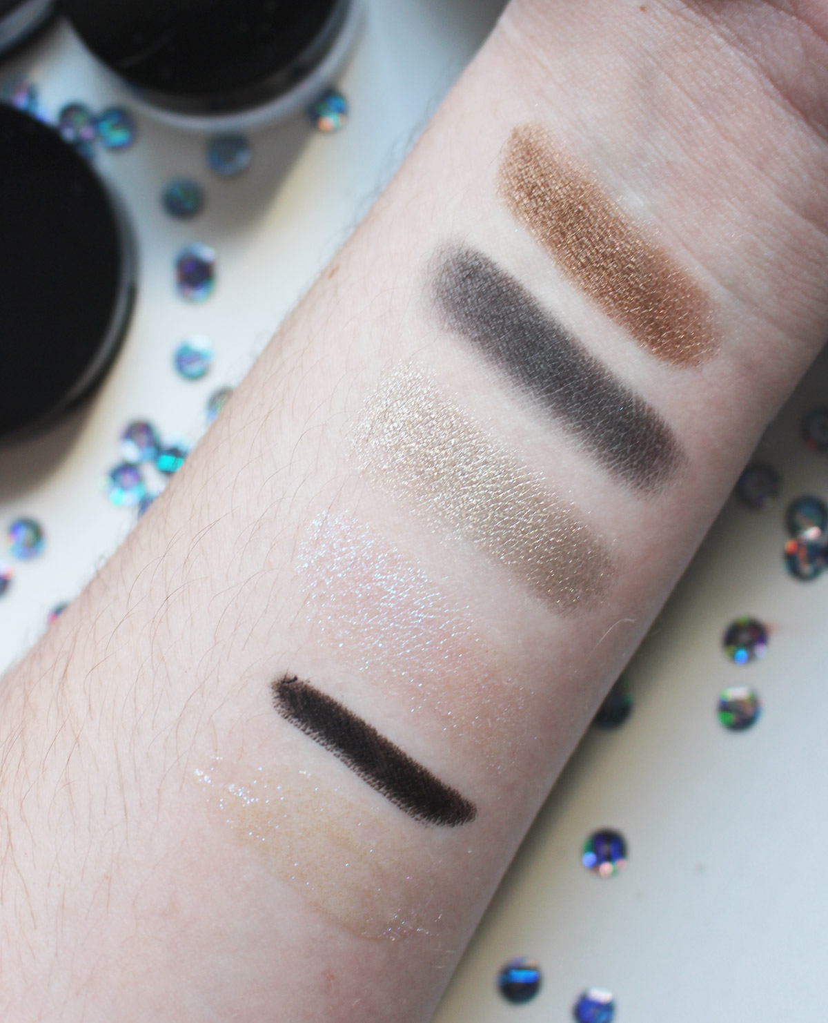 Ultrasuede Brown, Dark Matter, Mercury, Astral White, Kohl Liner, Eye Gloss
