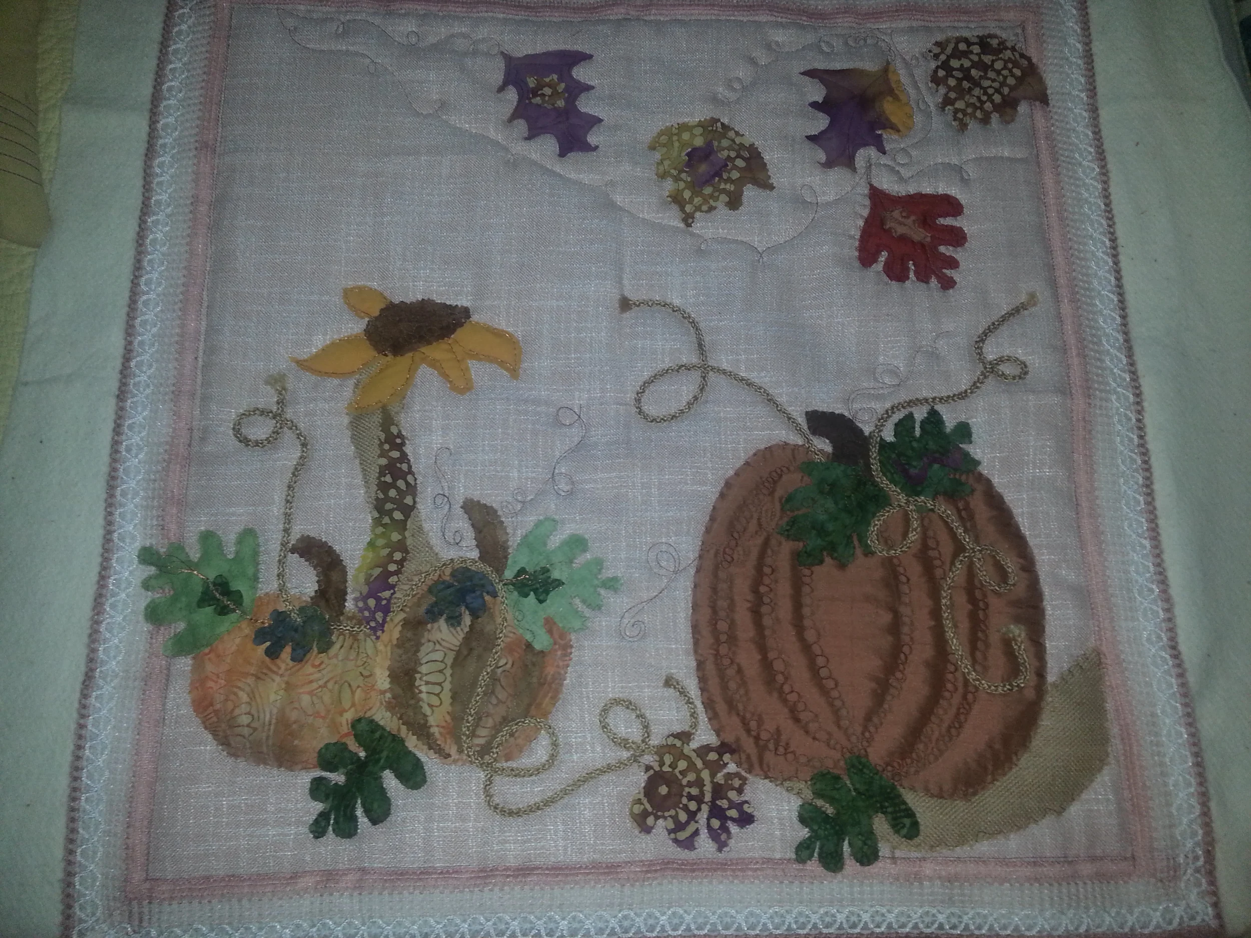 A fall wall hanging made on the fly. Who says a longarm can only do quilts?