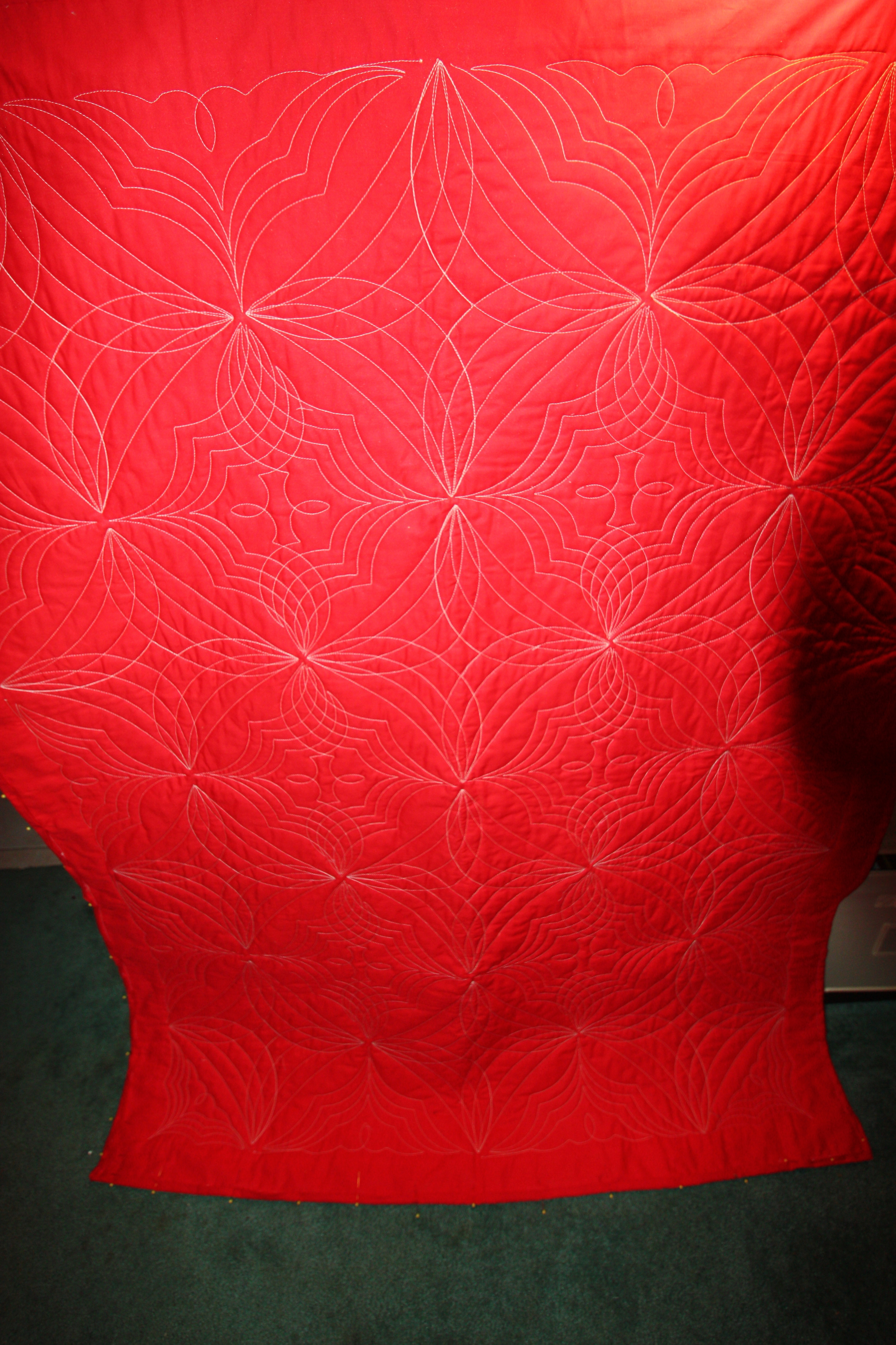 The back of the quilt really shows off the quilting.