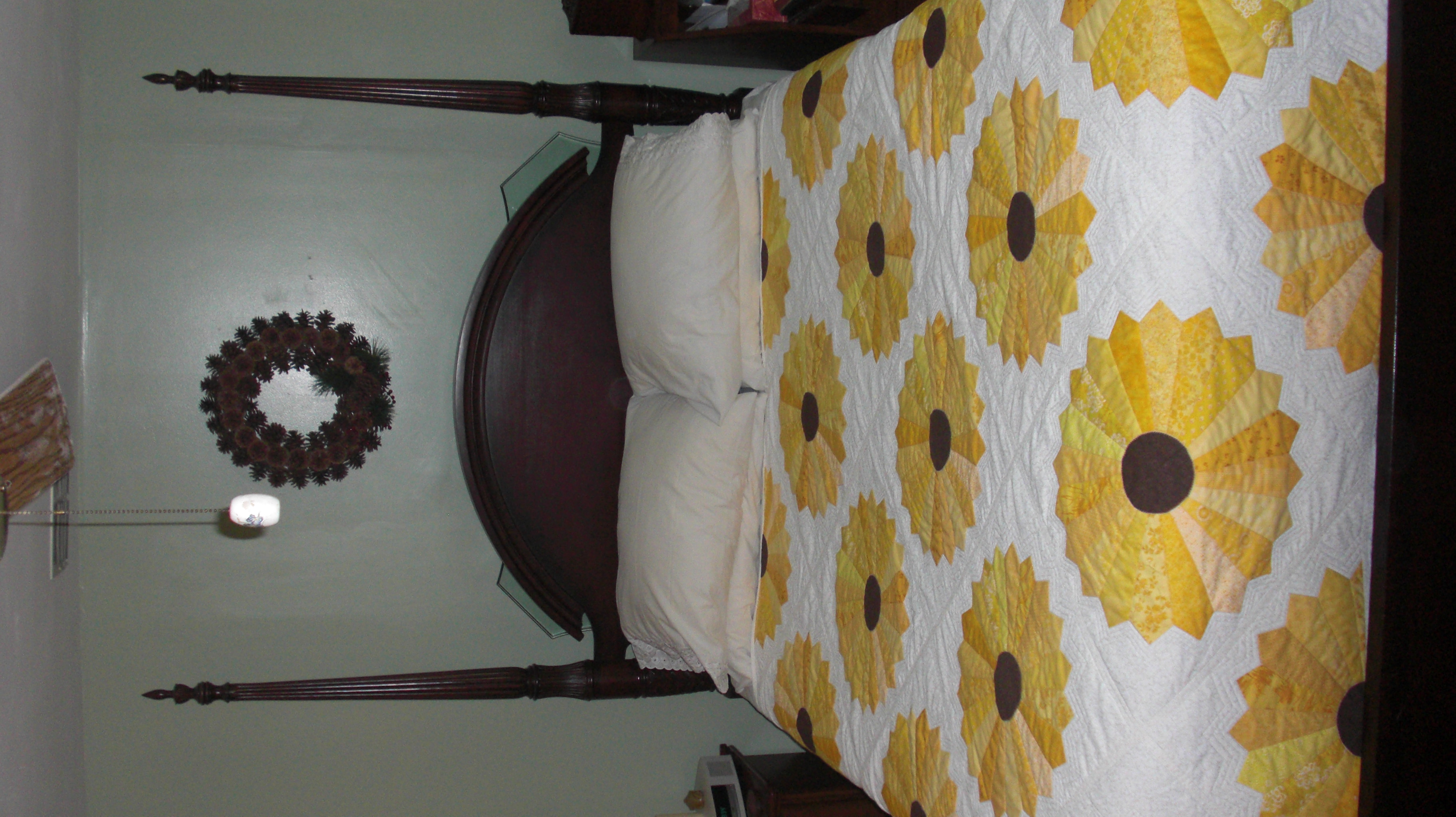 Reversible Dresden Plate sunflower quilt. Cost for king-size is $600.
