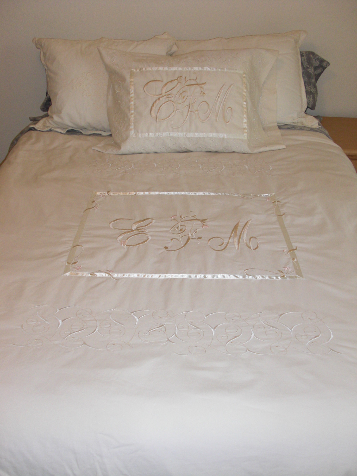 An elegant monogrammed duvet and sham set costs $300 (Materials are NOT included).