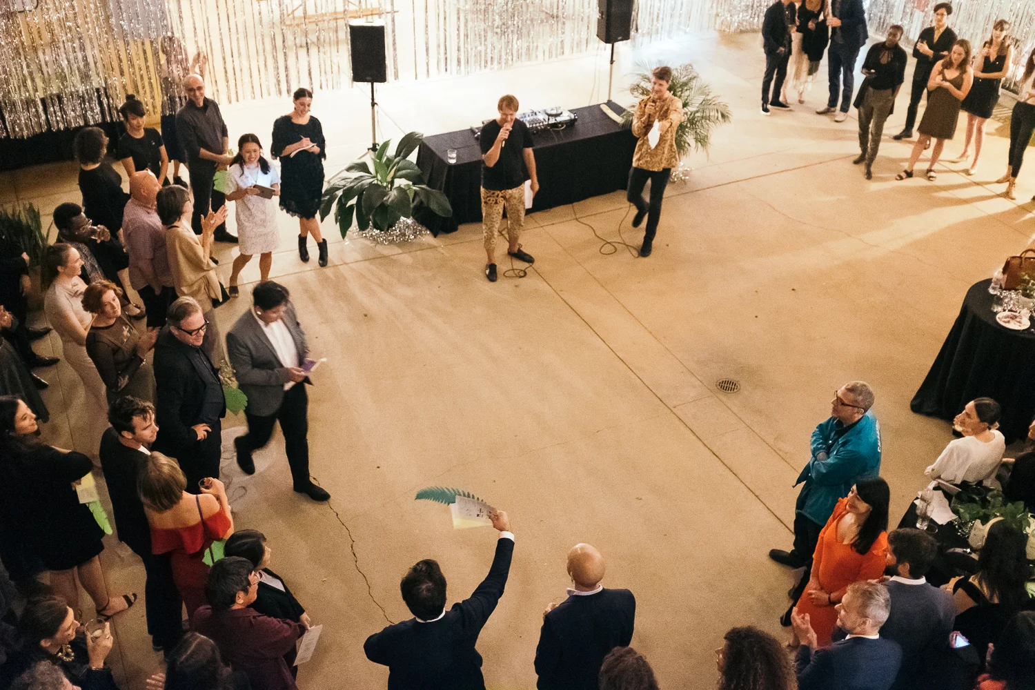 Snapshot of the paddle raise at the 2018 Fête at Fifteen event hosted at Mandarin Plaza.