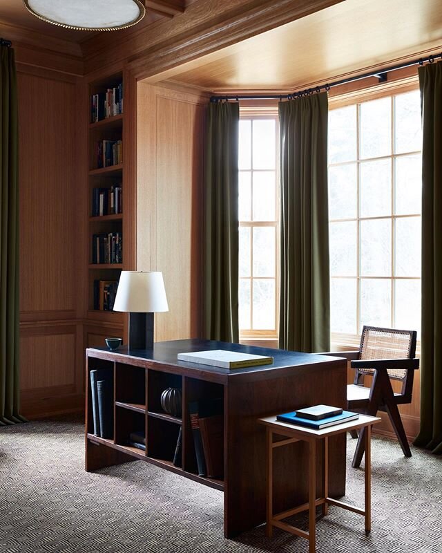 A &lsquo;pigeonhole&rsquo; desk and &lsquo;king&rsquo; chair by Pierre Jeanneret sourced from one of my favorite galleries @mdfg.nyc in the library of our Rockleigh project now on @archdigest. #pierrejeanneret #jeanmichelfrank #arnebang