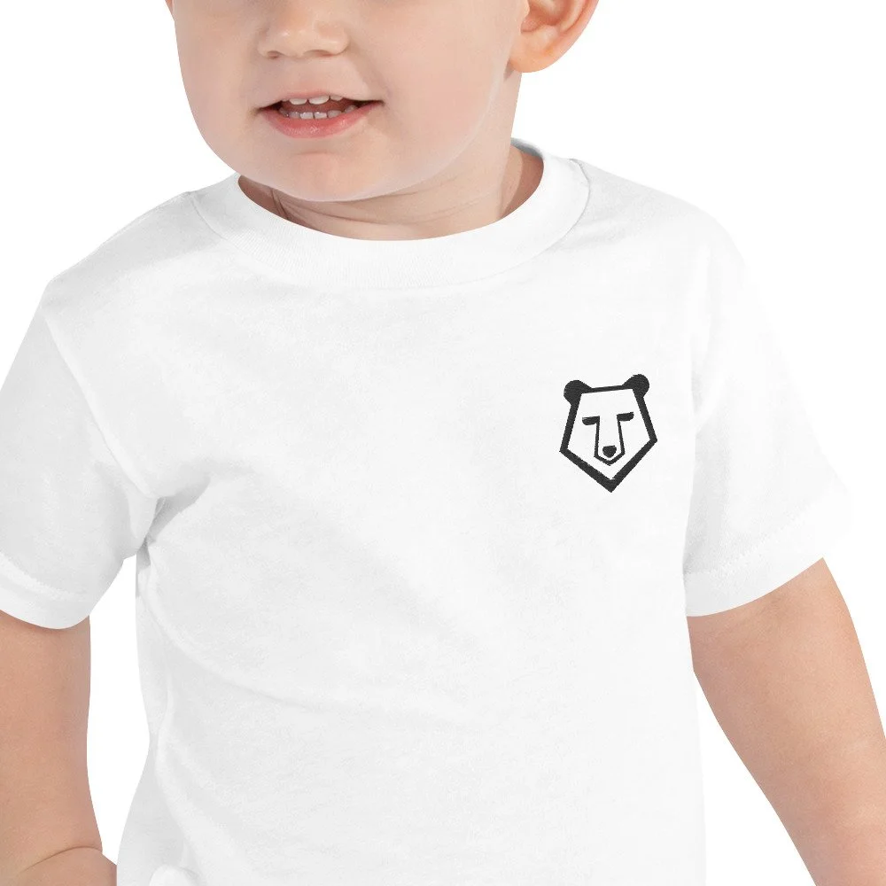 toddler-staple-tee-white-zoomed-in-69decf624f4cd.jpg